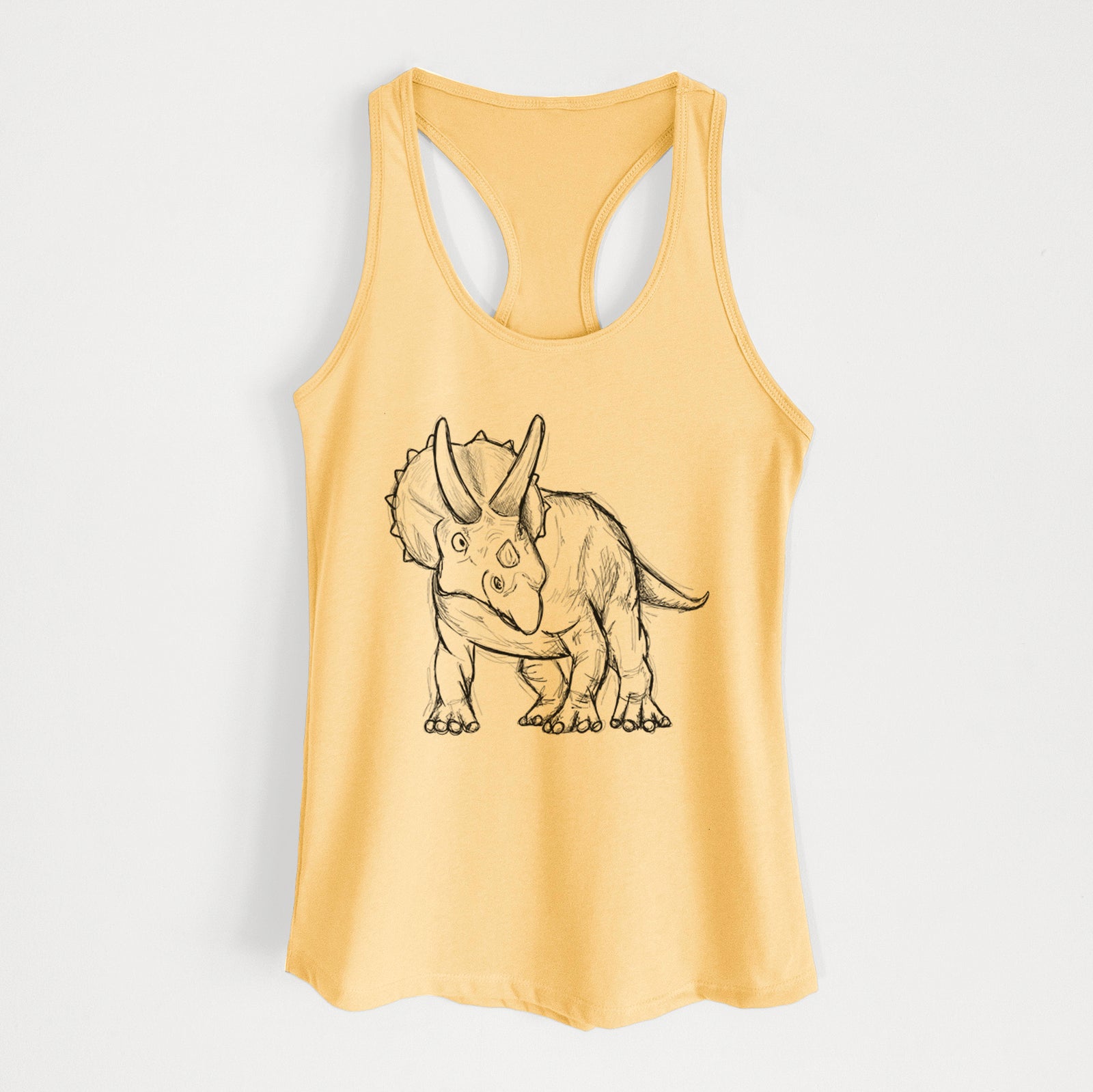 Banana cream women's racerback tank top laid flat, printed with a black ink illustration of a Triceratops walking.