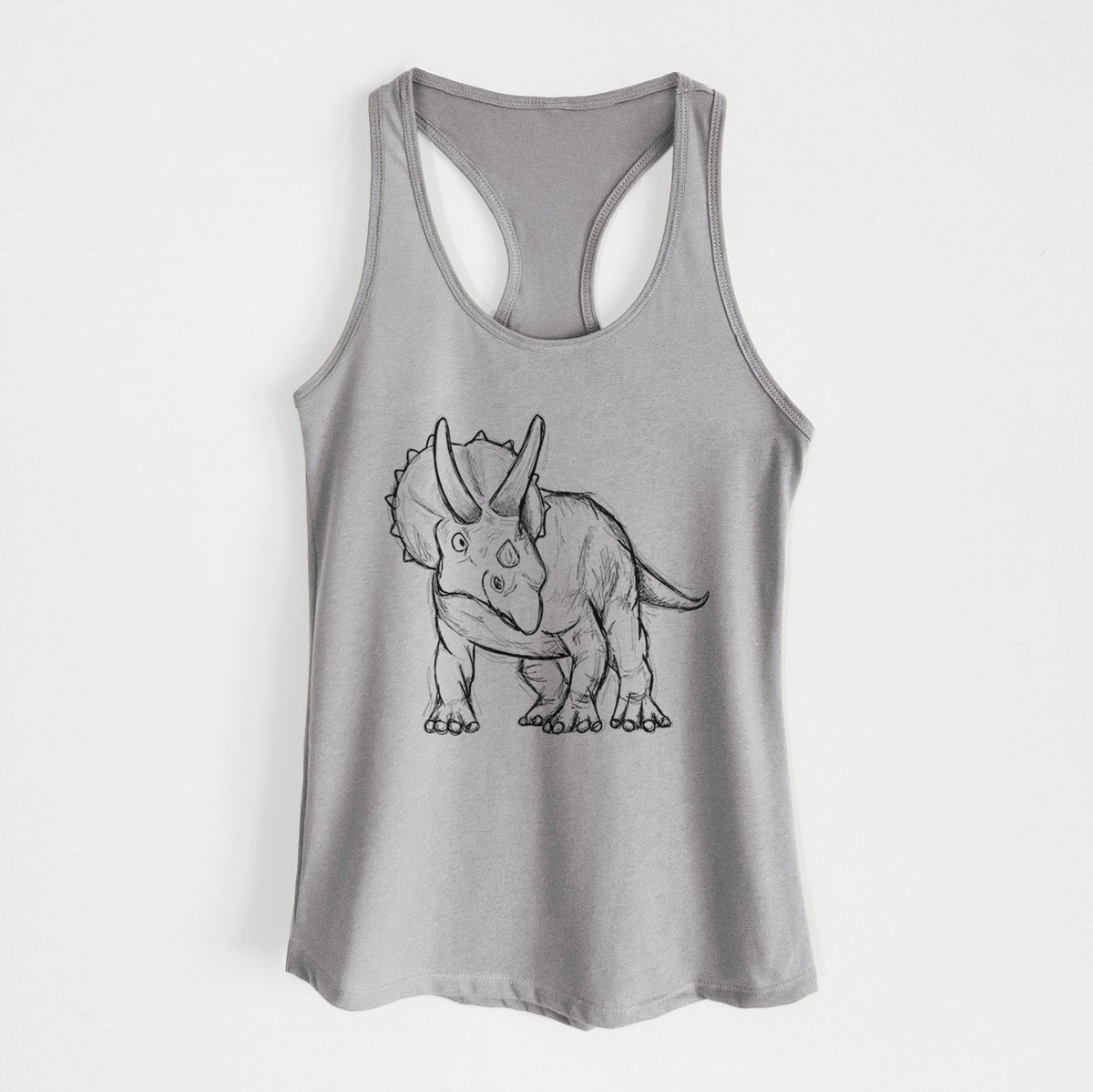 Heather grey women's racerback tank top laid flat, printed with a black ink illustration of a Triceratops walking.