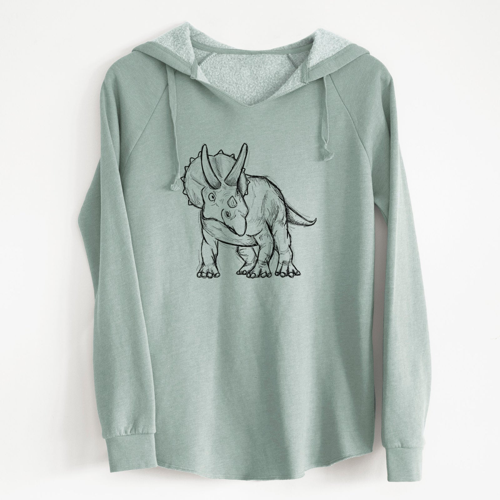 Sage green women's Cali Wave hooded sweatshirt laid flat, printed with a black ink illustration of a Triceratops walking.