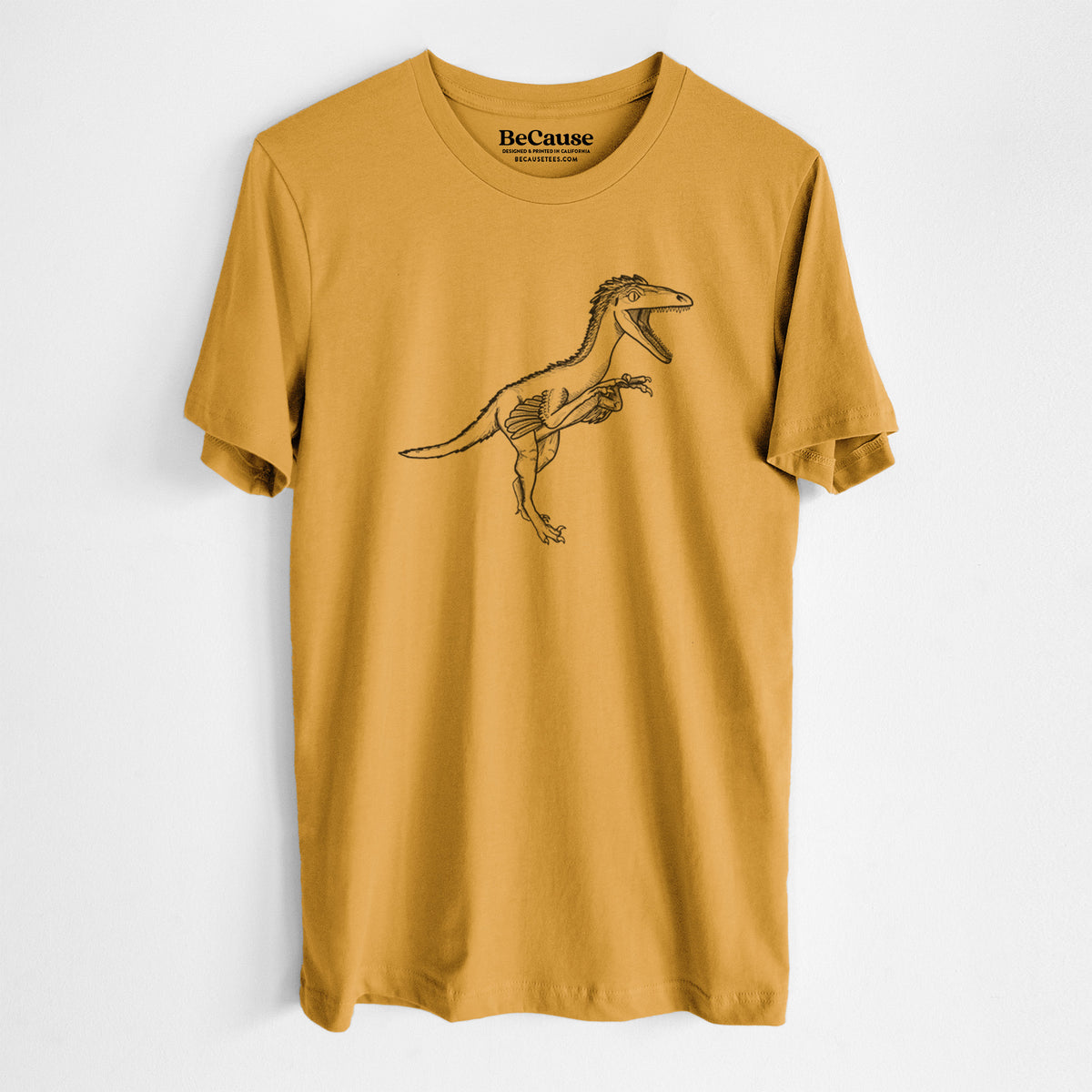 Mustard yellow lightweight cotton t-shirt laid flat, printed with a black ink illustration of a Troodon dinosaur running.