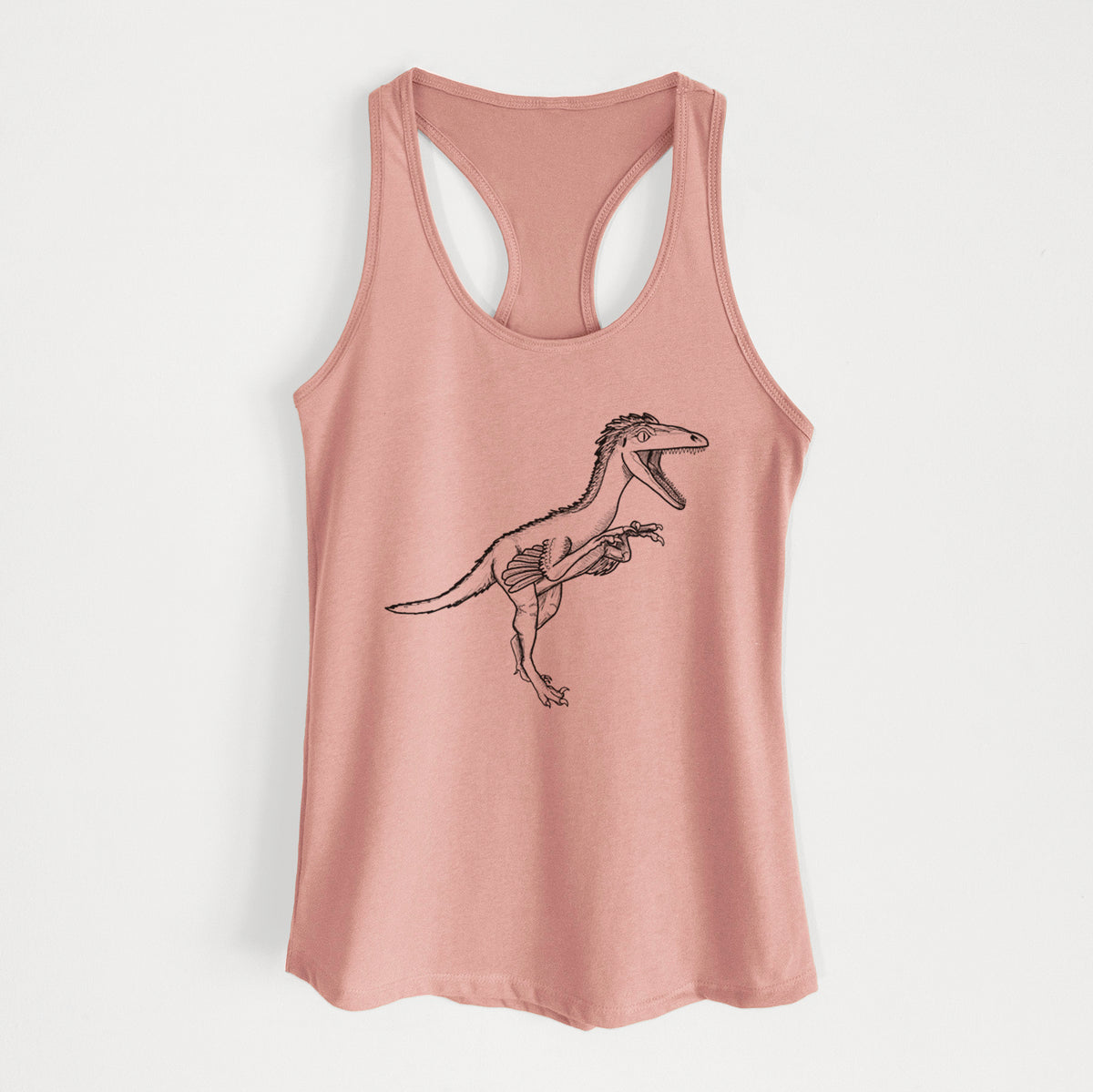 Desert pink women's racerback tank top laid flat, printed with a black ink illustration of a Troodon dinosaur running.