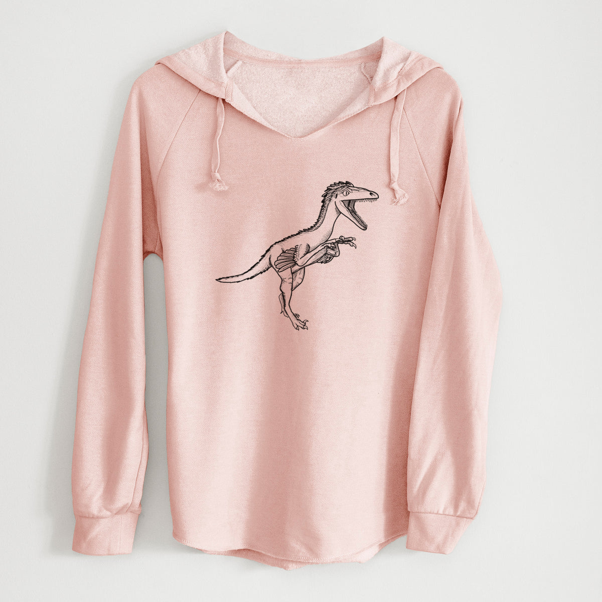 Blush pink women's Cali Wave hooded sweatshirt laid flat, printed with a black ink illustration of a Troodon dinosaur running.