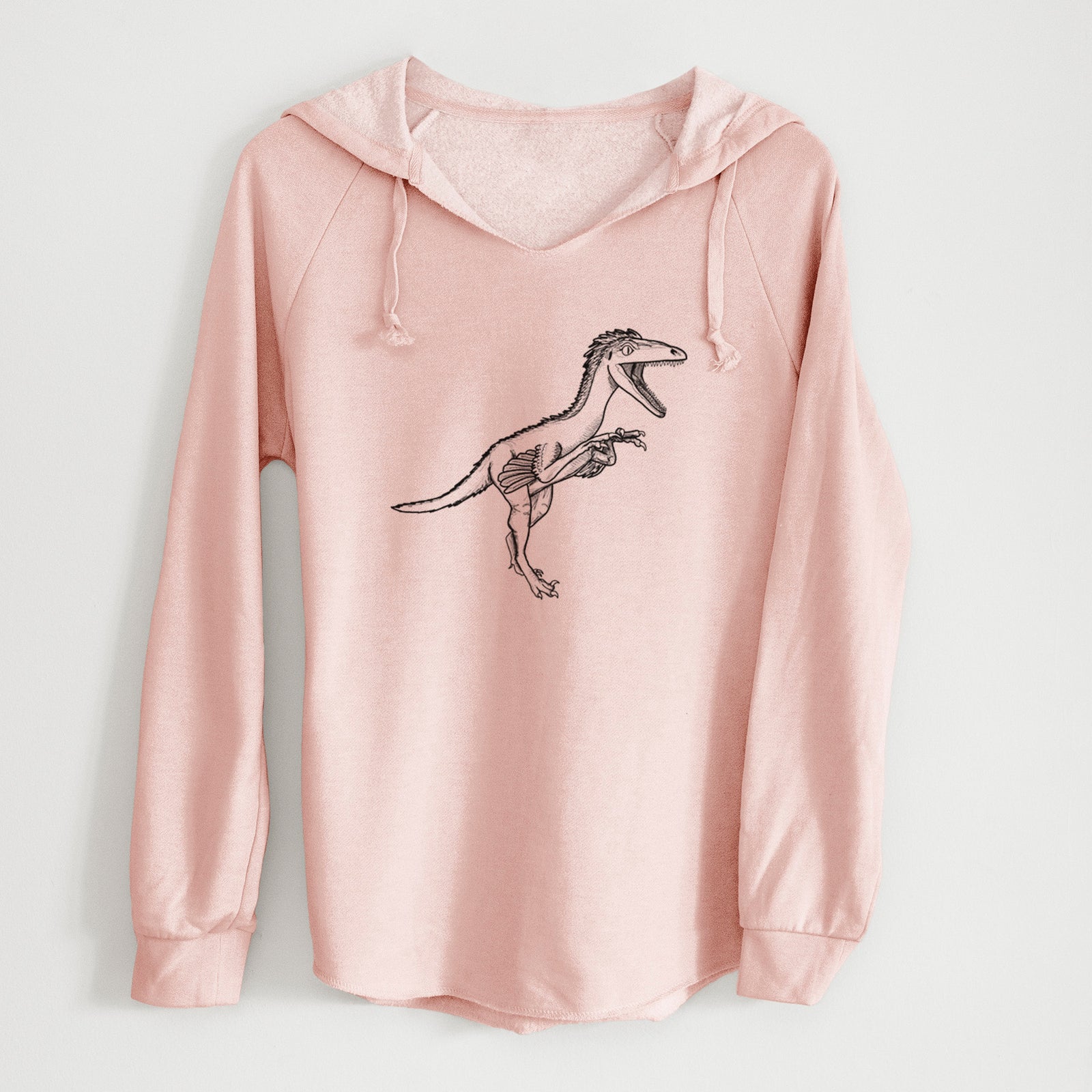 Sage green women's Cali Wave hooded sweatshirt laid flat, printed with a black ink illustration of a Troodon dinosaur running.