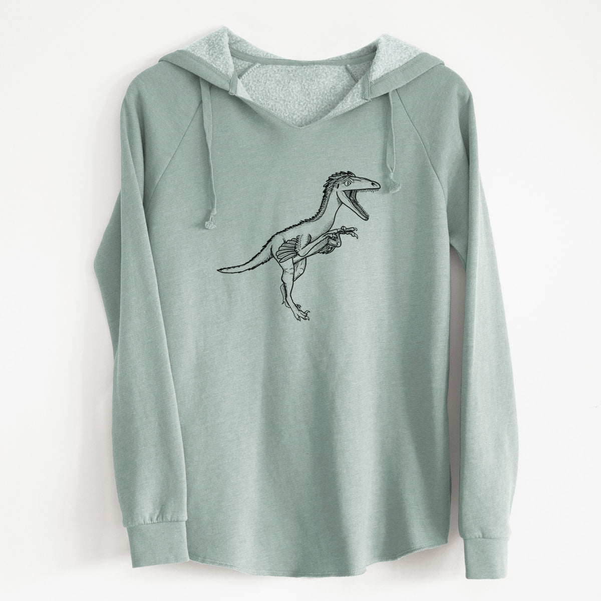 Sage green women's Cali Wave hooded sweatshirt laid flat, printed with a black ink illustration of a Troodon dinosaur running.