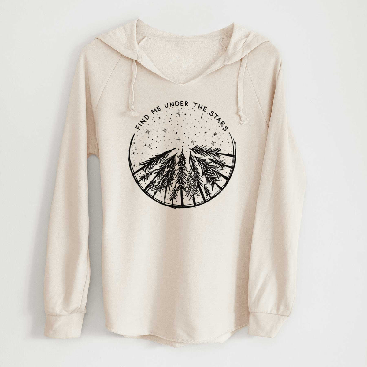 Bone cream women's Cali Wave hooded sweatshirt laid flat, printed with a circle of pine trees under a starry sky, with the words Find Me Under the Stars.