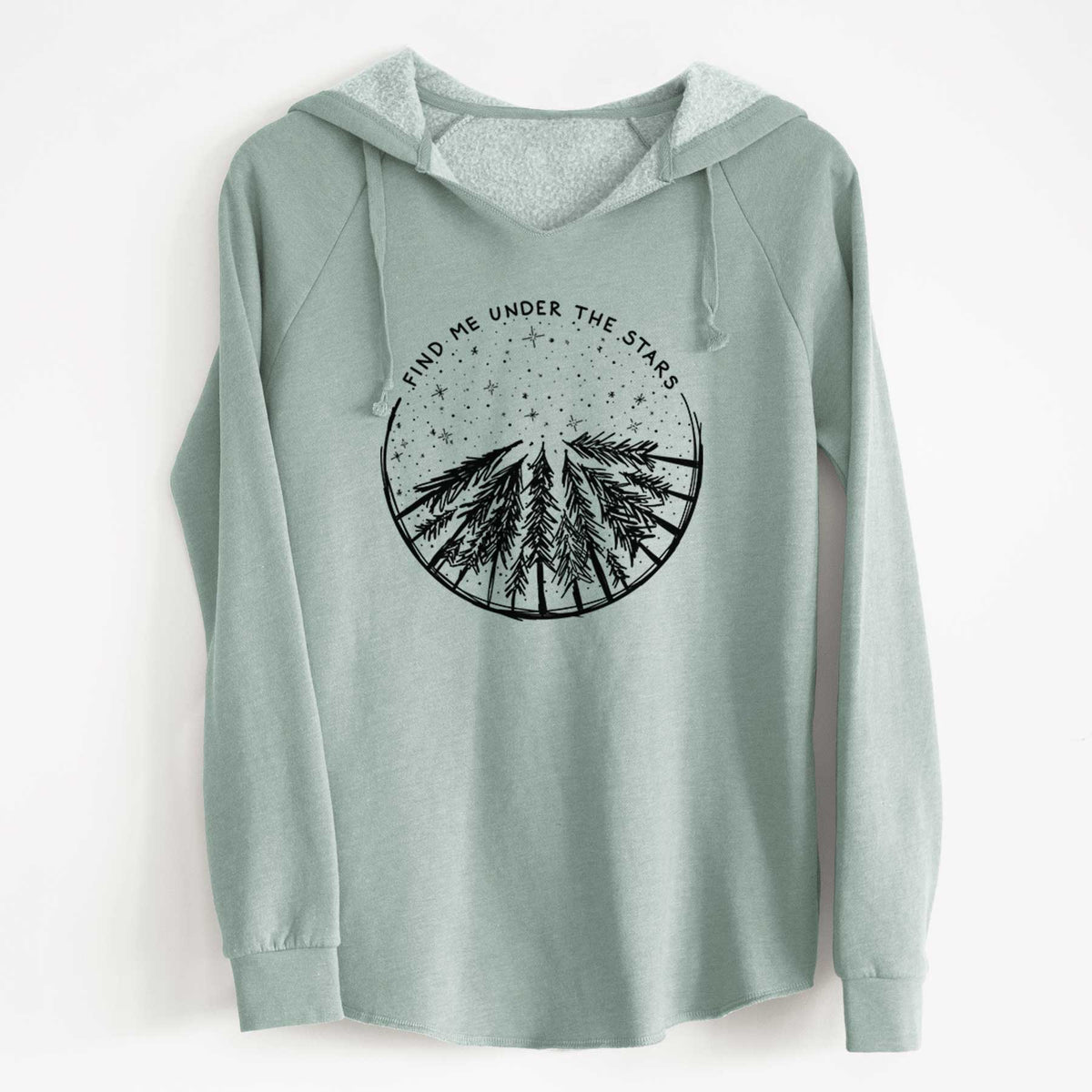 Sage green women's Cali Wave hooded sweatshirt laid flat, printed with a circle of pine trees under a starry sky, with the words Find Me Under the Stars.