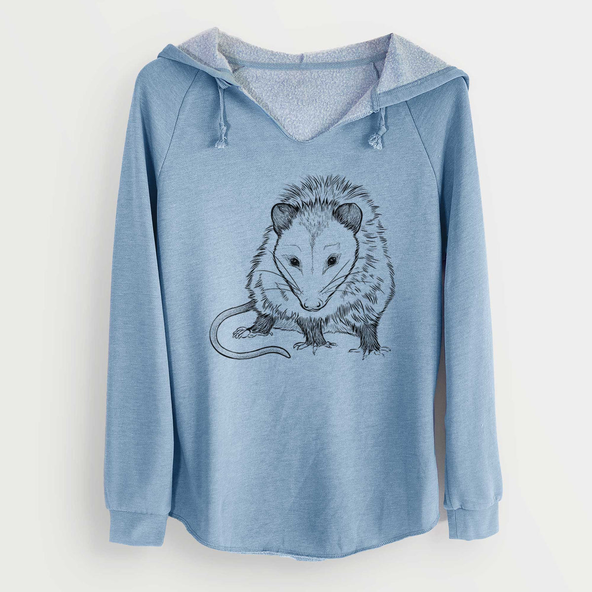 Misty blue women's Cali Wave hooded sweatshirt laid flat, printed with a detailed black ink illustration of a Virginia opossum standing with its long tail curled.