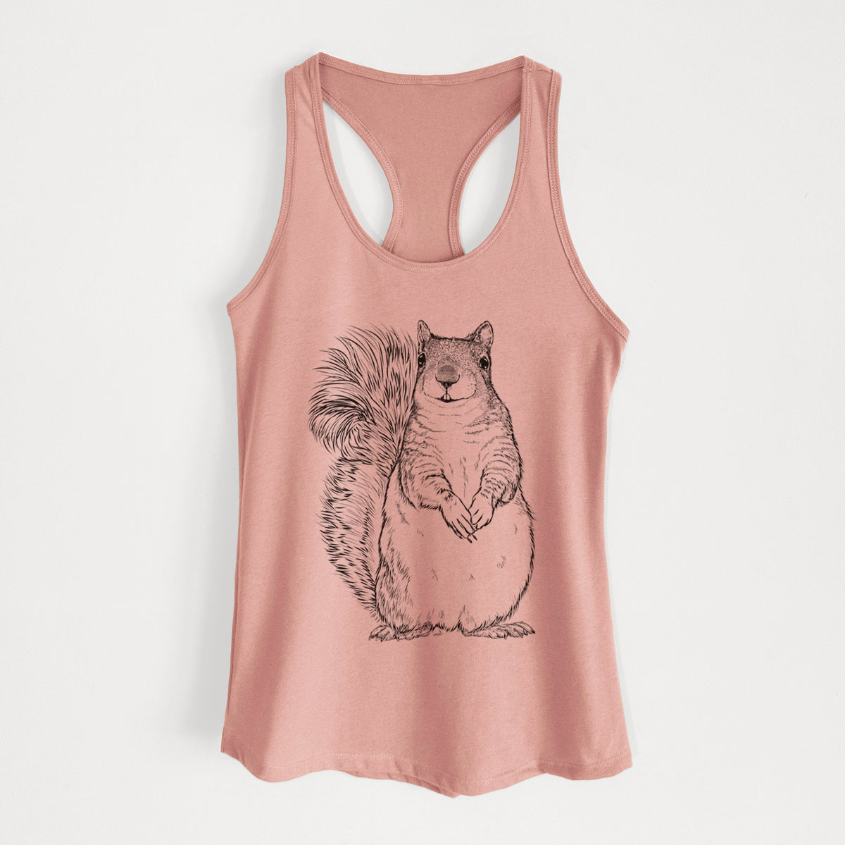 Desert pink women's racerback tank top laid flat, printed with a detailed black ink illustration of a western grey squirrel sitting upright with a bushy tail.