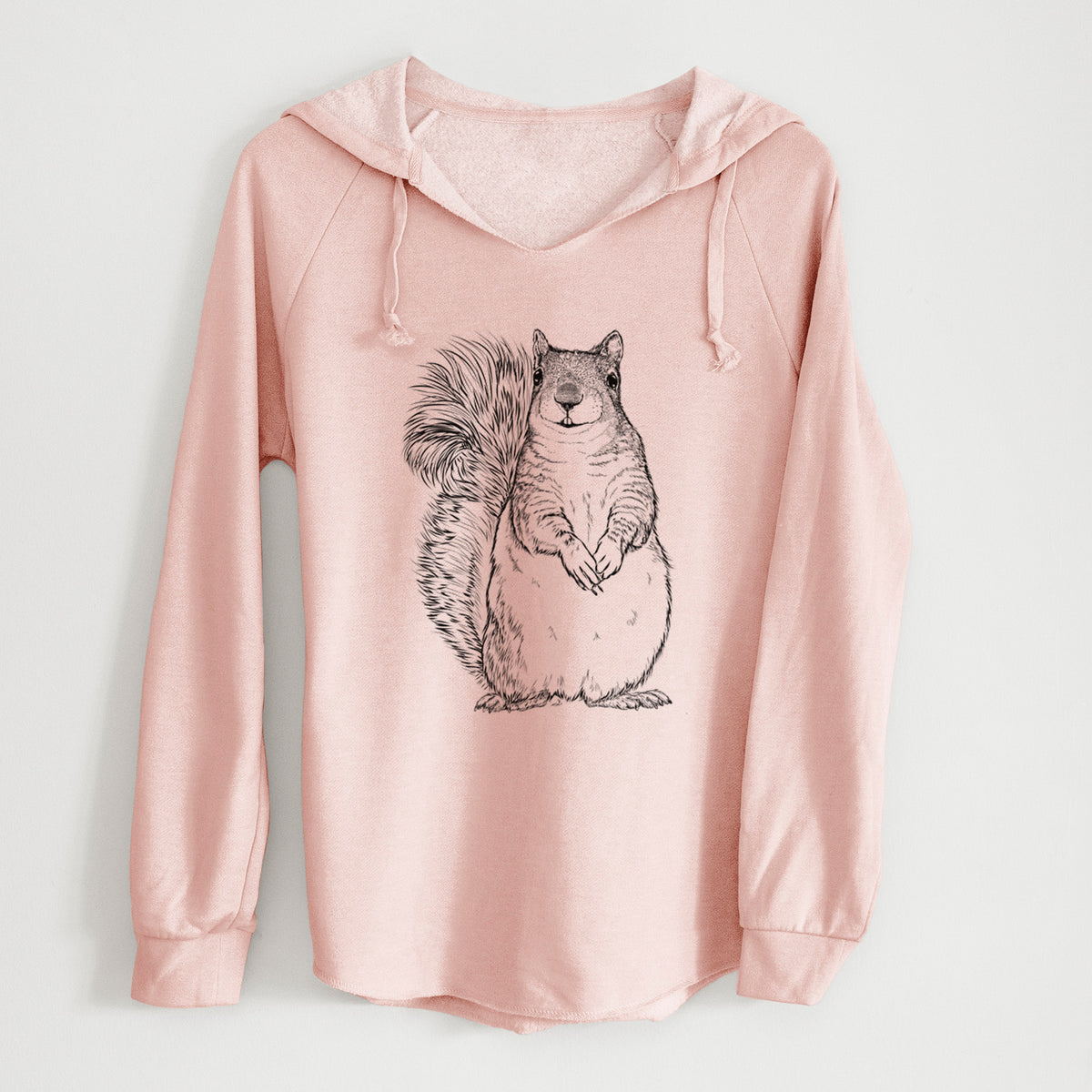 Blush pink women's Cali Wave hooded sweatshirt laid flat, printed with a detailed black ink illustration of a western grey squirrel sitting upright with a bushy tail.