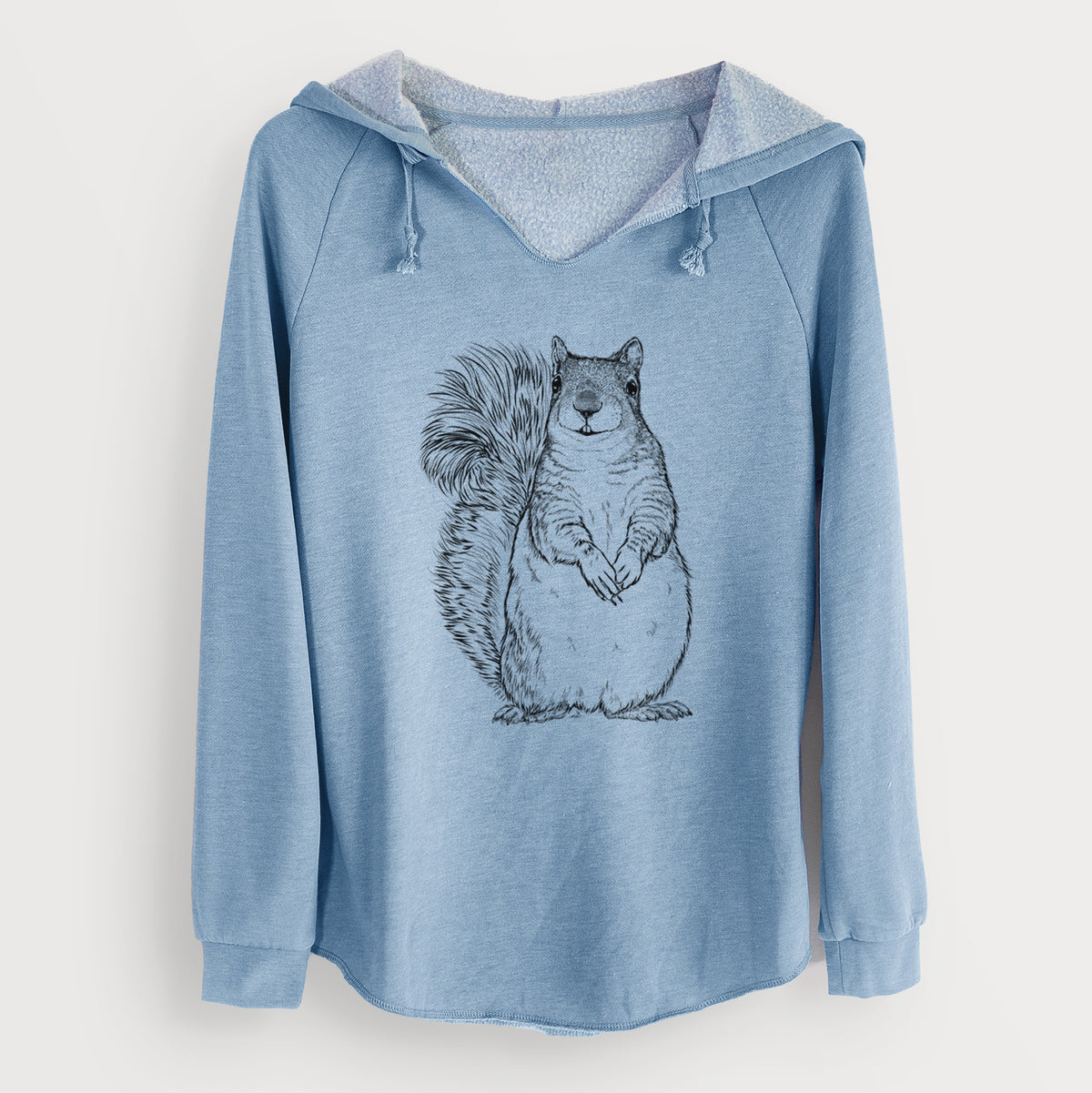 Misty blue women's Cali Wave hooded sweatshirt laid flat, printed with a detailed black ink illustration of a western grey squirrel sitting upright with a bushy tail.
