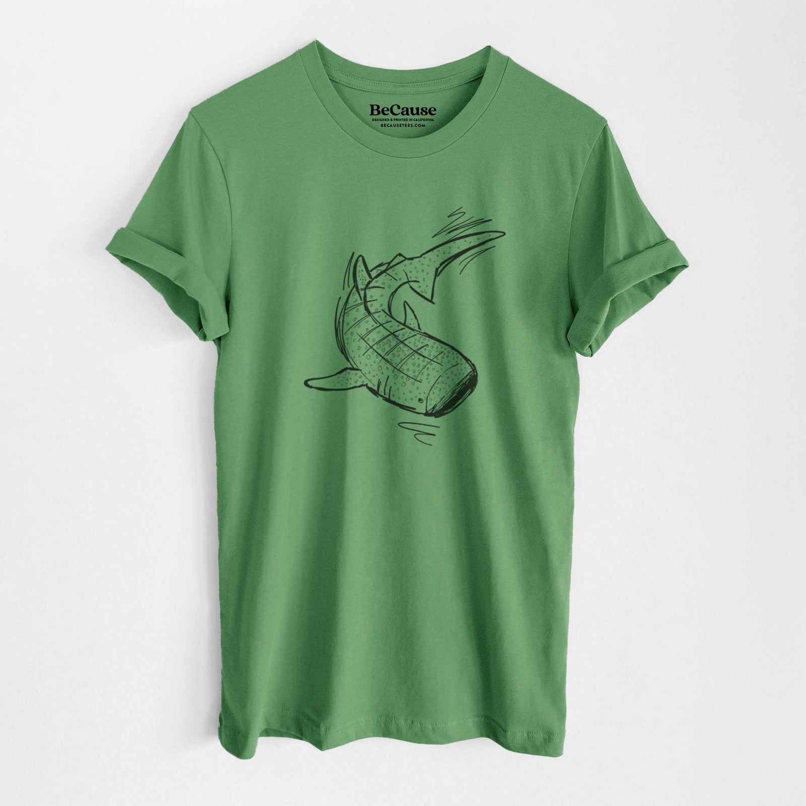 Leaf green lightweight cotton t-shirt laid flat, printed with a black ink illustration of a spotted whale shark swimming.