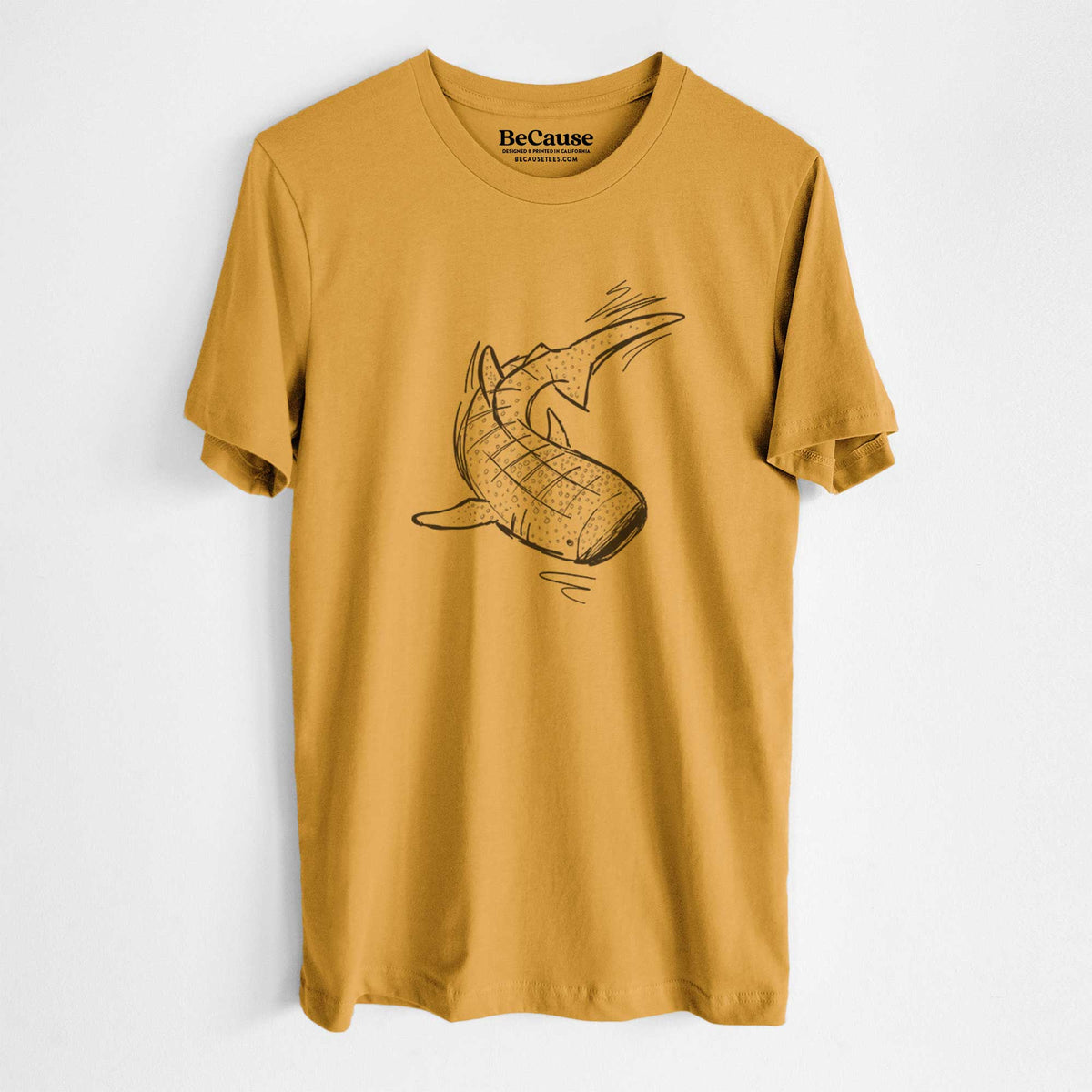 Mustard yellow lightweight cotton t-shirt laid flat, printed with a black ink illustration of a spotted whale shark swimming.