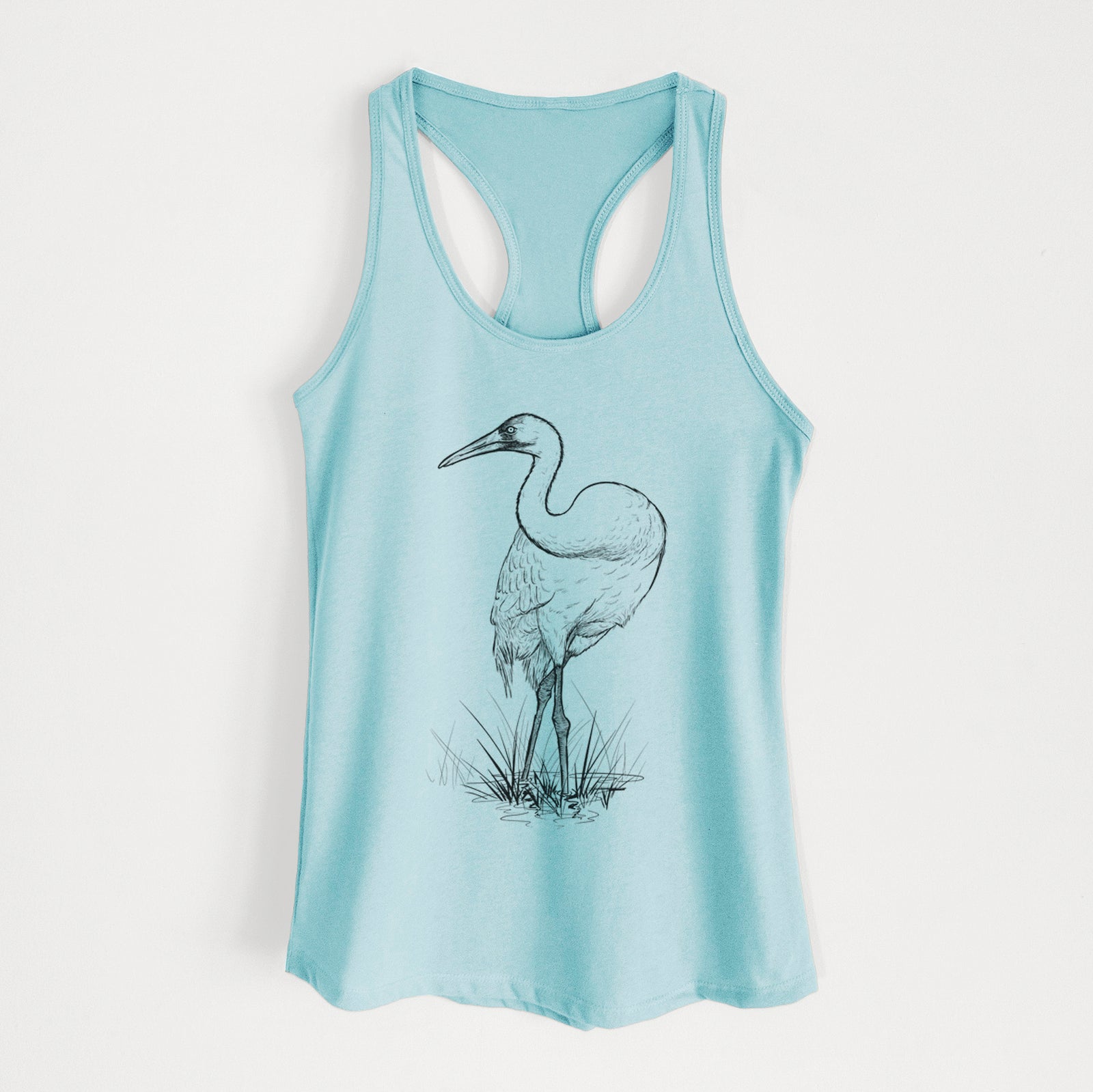 Banana cream women's racerback tank top laid flat, printed with a detailed black ink illustration of a whooping crane standing in grass.