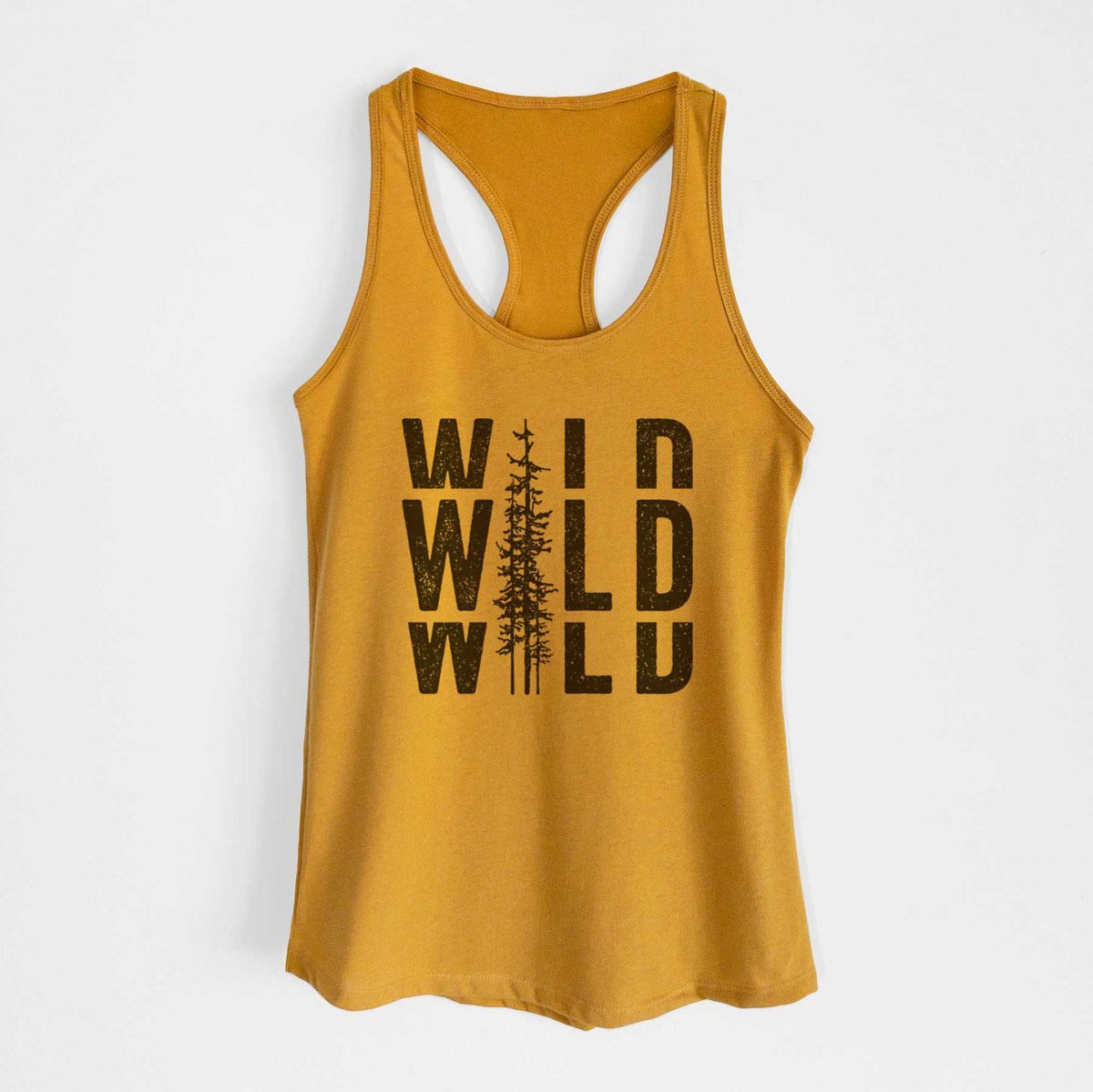 Gold women's racerback tank top laid flat, printed with bold black text reading WILD stacked three times, with a tall pine tree forming the letter I.