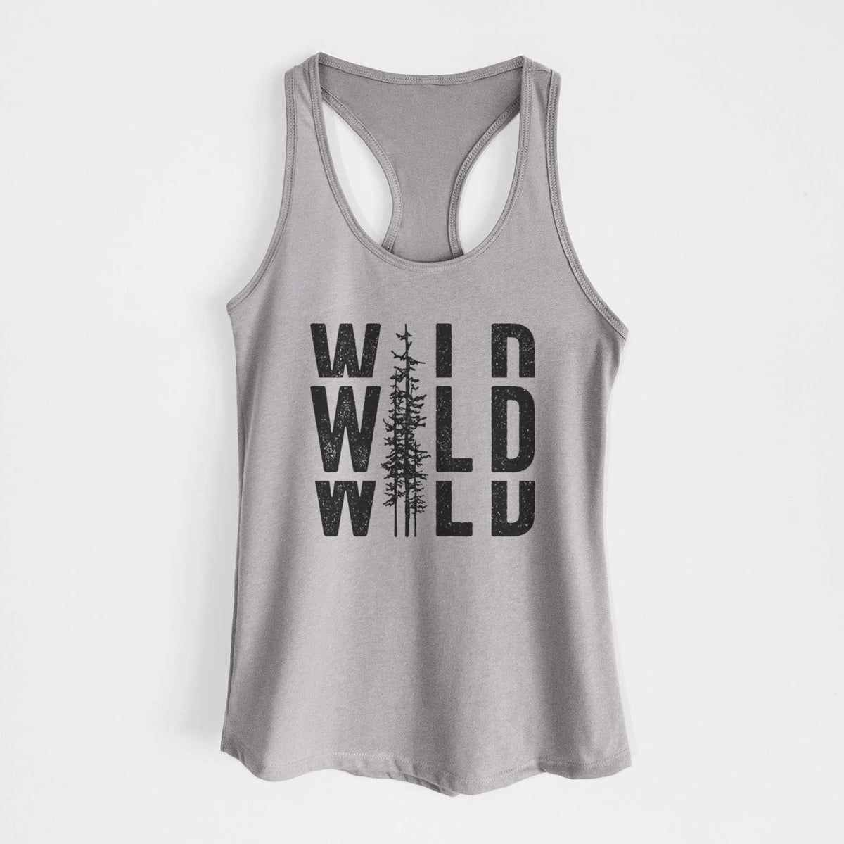 Heather grey women's racerback tank top laid flat, printed with bold black text reading WILD stacked three times, with a tall pine tree forming the letter I.