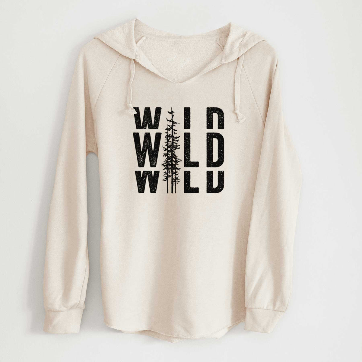 Bone cream women's Cali Wave hooded sweatshirt laid flat, printed with bold black text reading WILD stacked three times, with a tall pine tree forming the letter I.