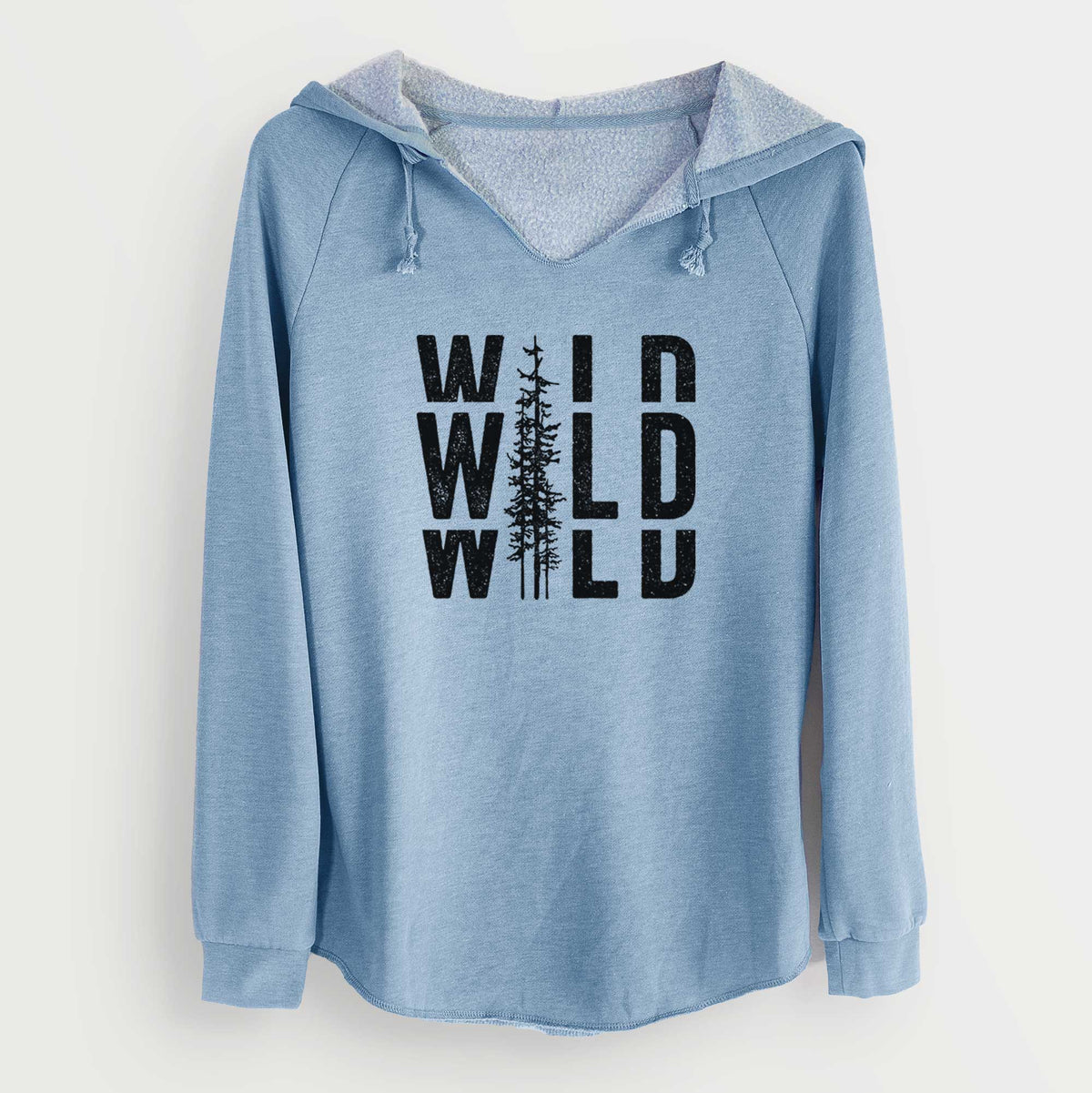 Misty blue women's Cali Wave hooded sweatshirt laid flat, printed with bold black text reading WILD stacked three times, with a tall pine tree forming the letter I.