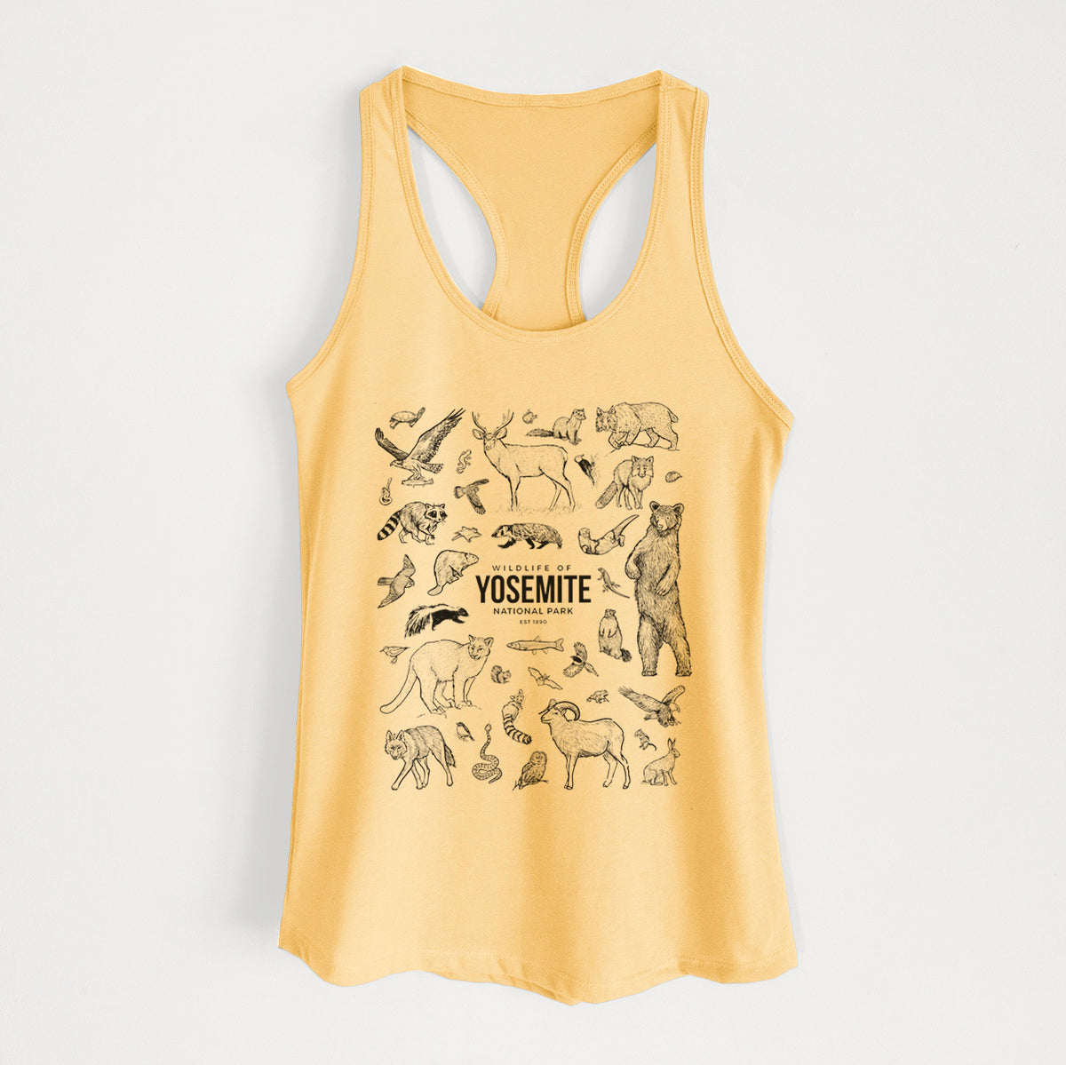 Banana cream women's racerback tank top laid flat, printed with a collection of black ink wildlife illustrations surrounding the words Yosemite National Park.