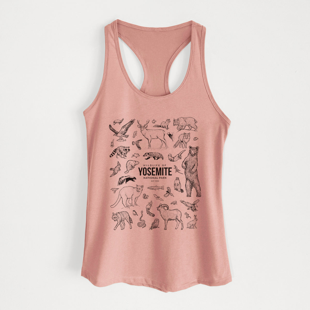 Desert pink women's racerback tank top laid flat, printed with a collection of black ink wildlife illustrations surrounding the words Yosemite National Park.