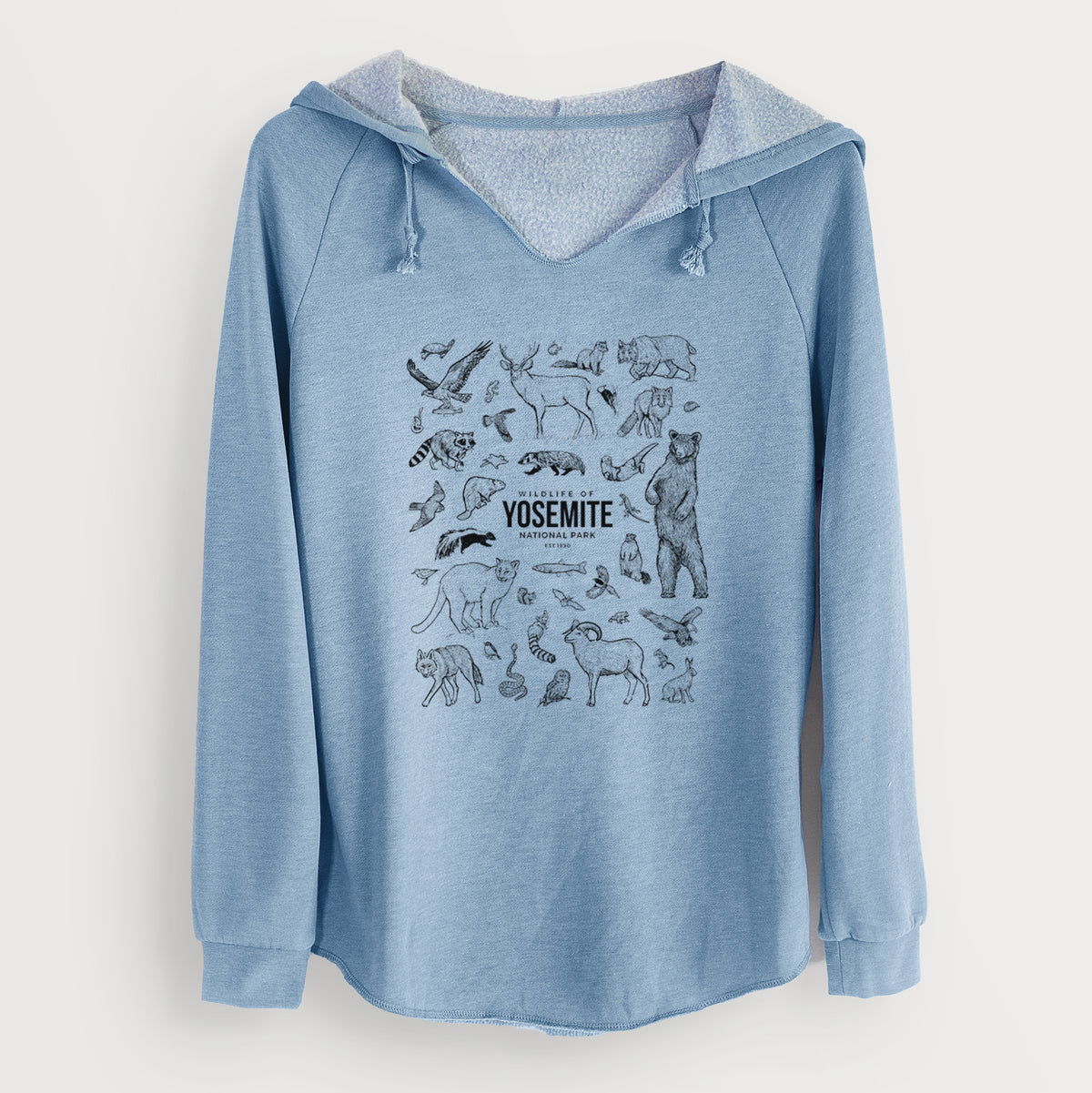 Misty blue women's Cali Wave hooded sweatshirt laid flat, printed with a collection of black ink wildlife illustrations surrounding the words Yosemite National Park.