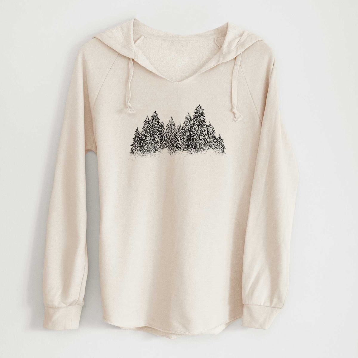 Bone cream women's Cali Wave hooded sweatshirt laid flat, printed with a black ink illustration of a row of snow-dusted evergreen trees.