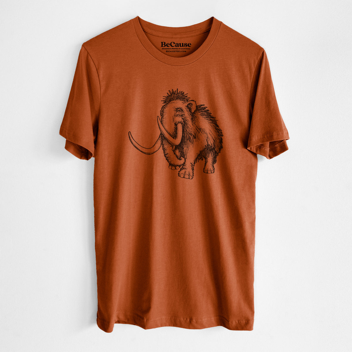 Autumn lightweight cotton t-shirt laid flat, printed with a black ink illustration of a woolly mammoth with long curved tusks.