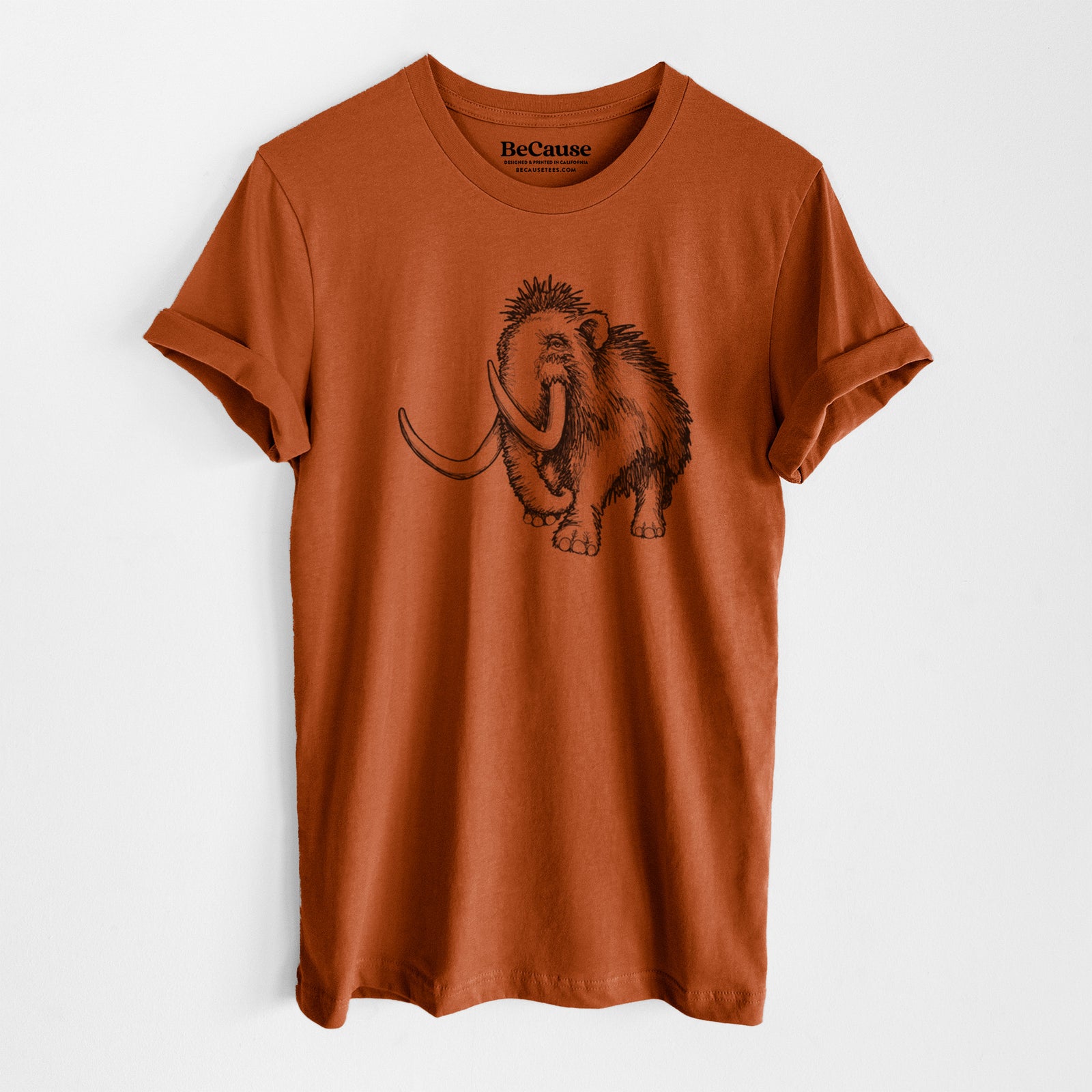 Autumn lightweight cotton t-shirt laid flat, printed with a black ink illustration of a woolly mammoth with long curved tusks.
