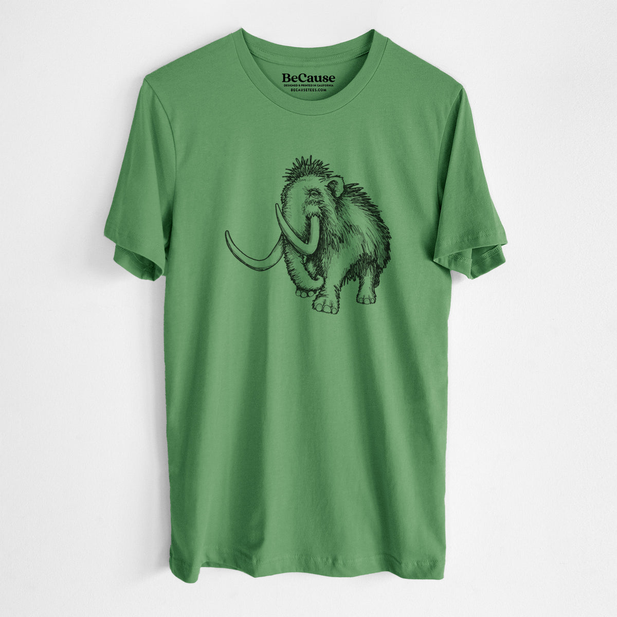 Leaf green lightweight cotton t-shirt laid flat, printed with a black ink illustration of a woolly mammoth with long curved tusks.