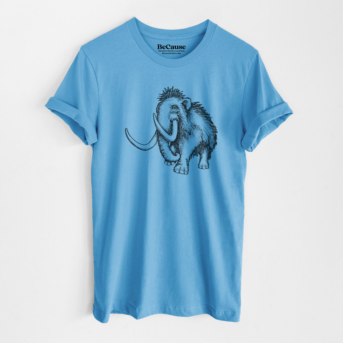 Ocean blue lightweight cotton t-shirt laid flat, printed with a black ink illustration of a woolly mammoth with long curved tusks.