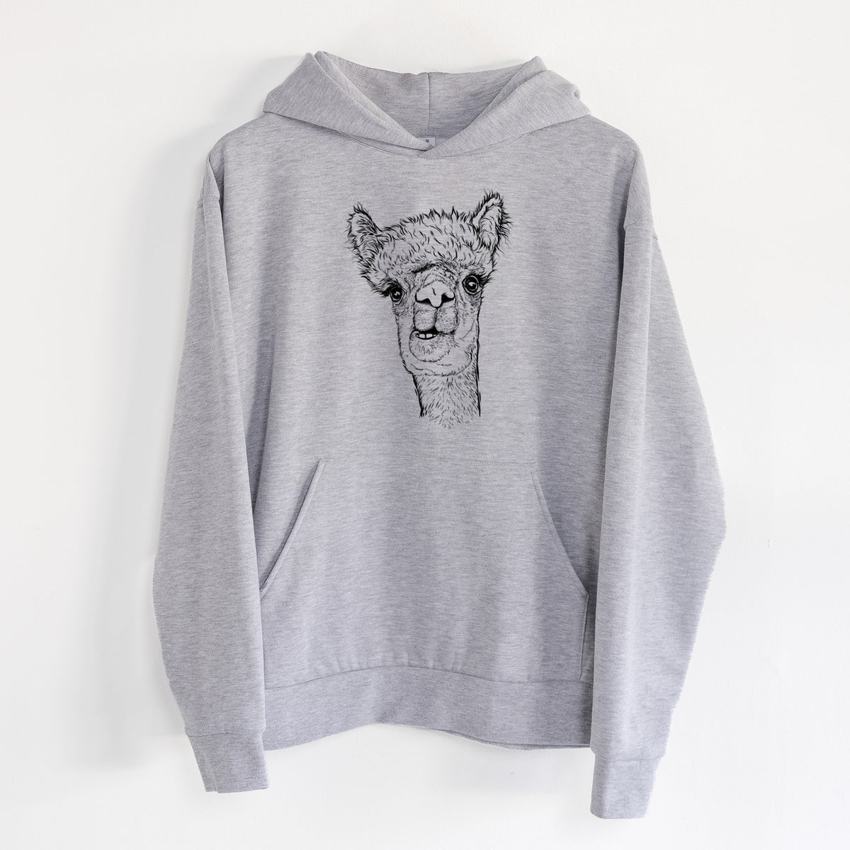 Alpaca - Statement Midweight Hoodie in Heather Grey, hanging on a white wall, with a front kangaroo pocket and no drawcords.