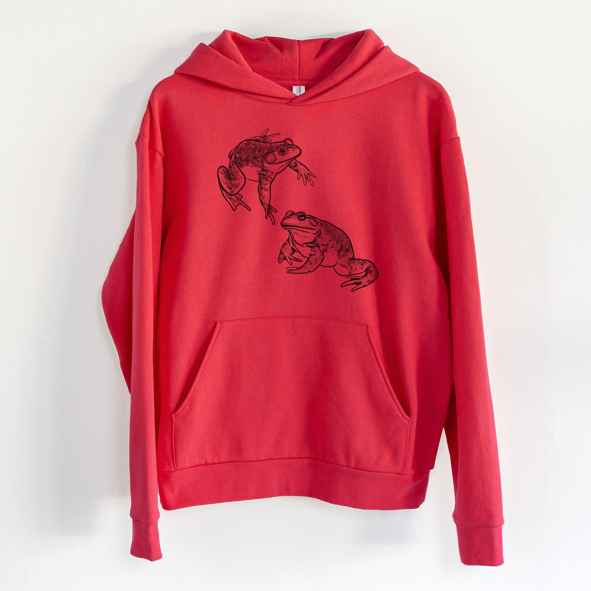 American Bullfrogs - Lithobates catesbeianus - Statement Midweight Hoodie in Cherry Red, hanging on a white wall, with a front kangaroo pocket and no drawcords.