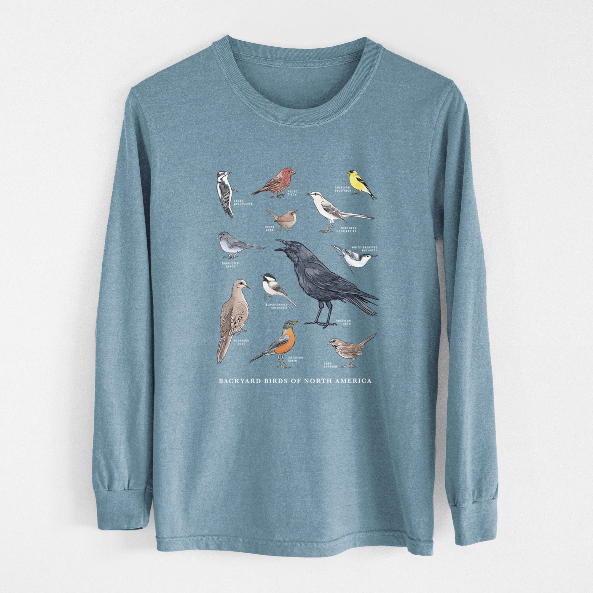 A long sleeve T-shirt in green color with a graphic print of various birds.