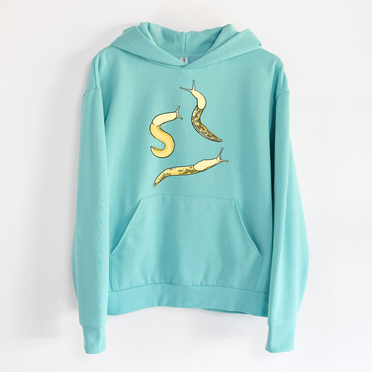 Banana Slug Squad - Ariolimax columbianus - Statement Midweight Hoodie in Seafoam, hanging on a white wall, with a front kangaroo pocket and no drawcords.