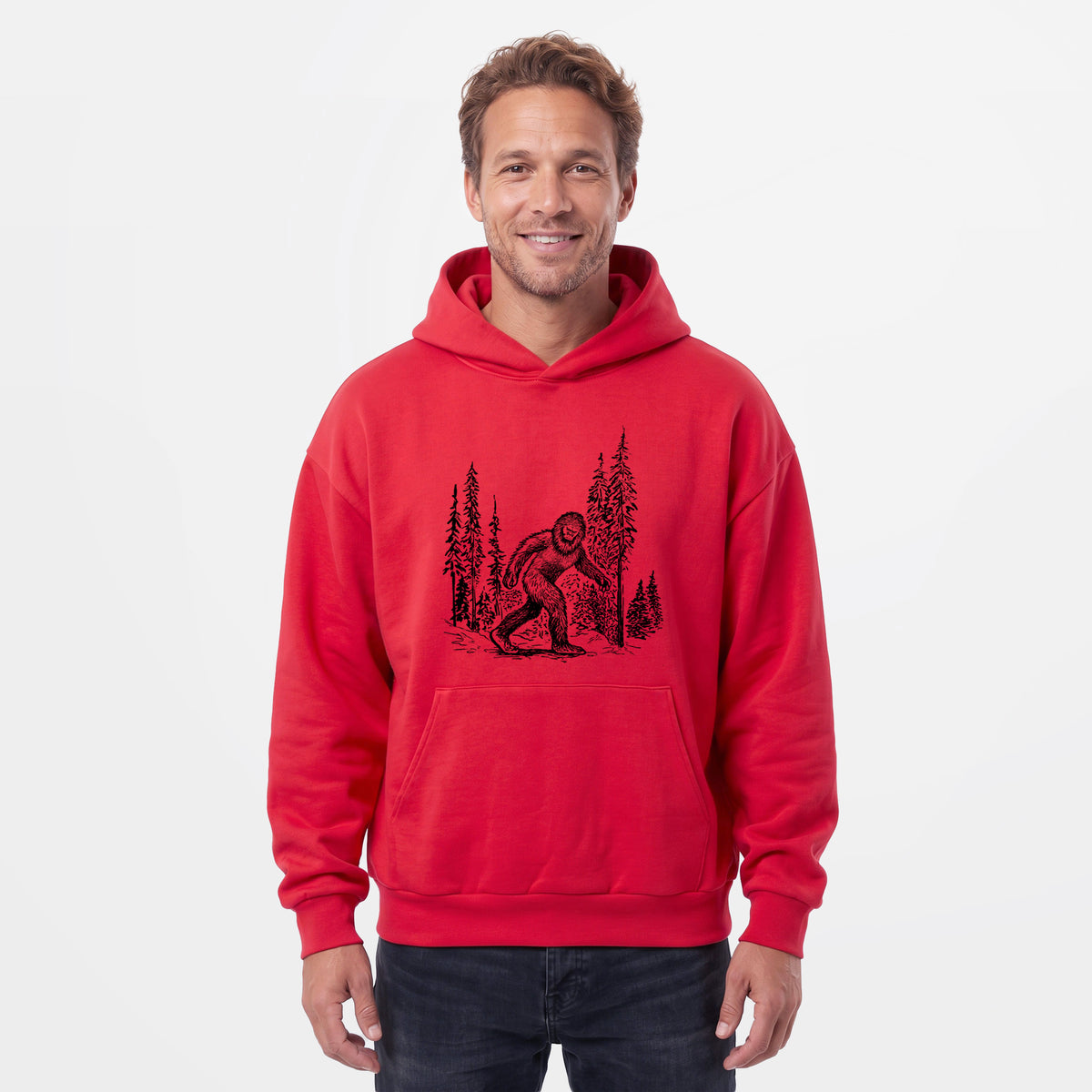Male model wearing the Bigfoot in the Woods - Statement Midweight Hoodie.