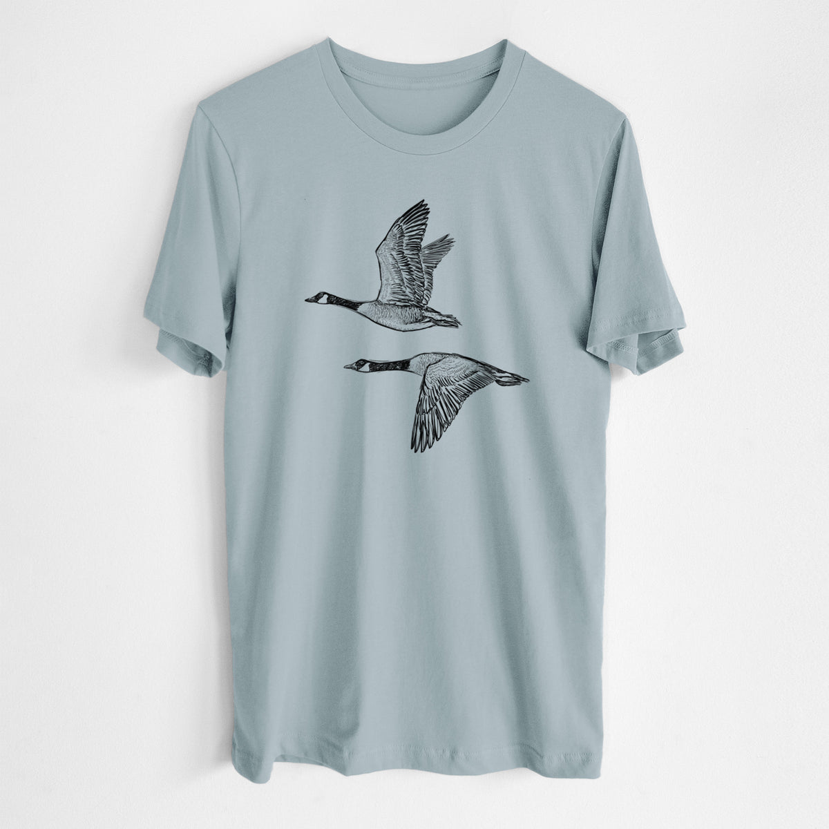Canada Geese in Flight - Branta canadensis - Lightweight 100% Cotton Unisex Crewneck in Vintage Denim, worn by model