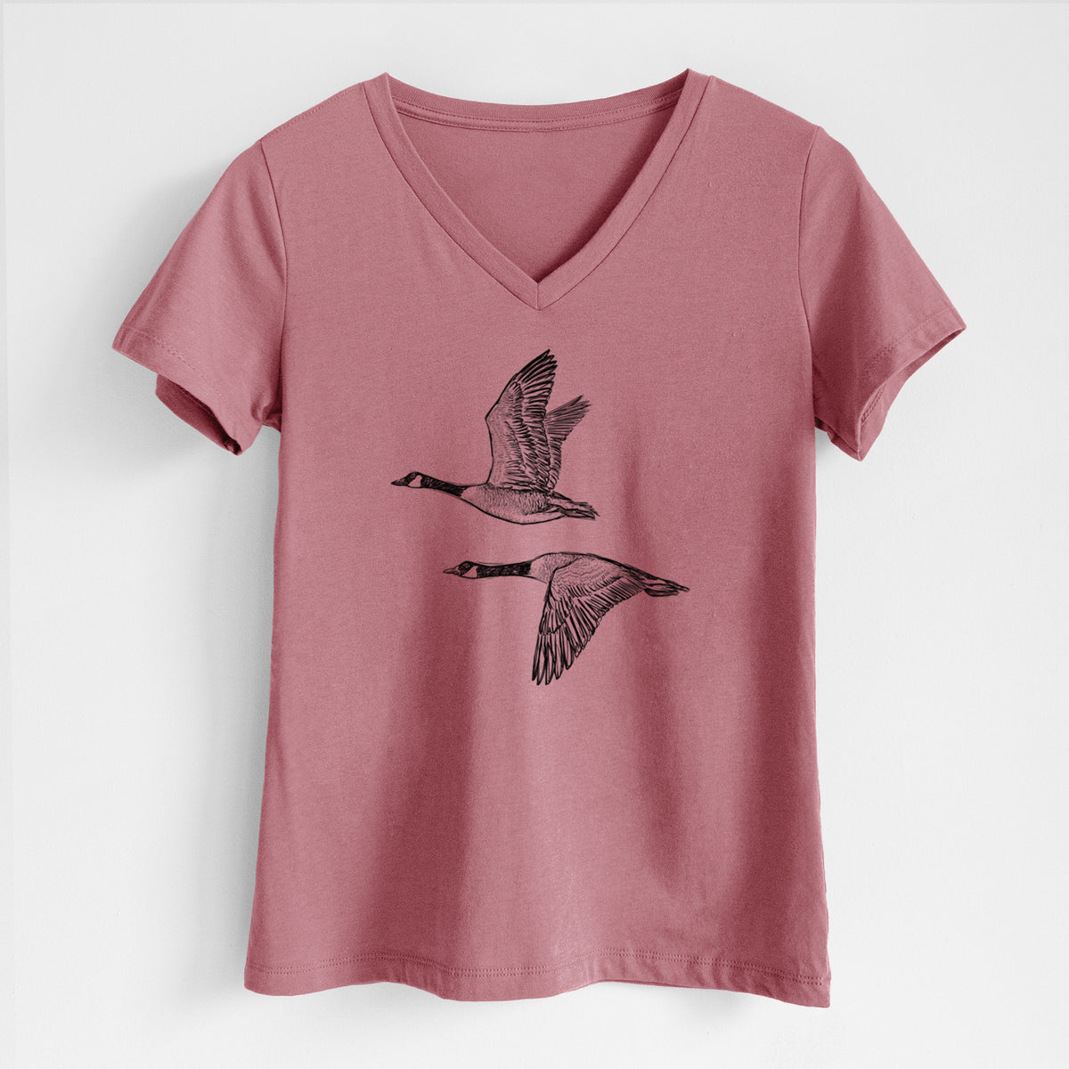 Canada Geese in Flight - Branta canadensis - Women's Lightweight Relaxed Fit 100% Cotton V-neck in Mauve, on a hanger