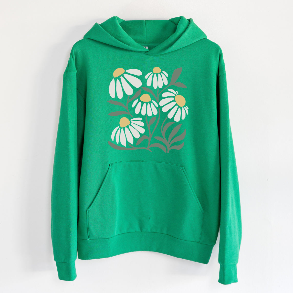 Chamomile Vibes - Statement Midweight Hoodie in Kelly Green, hanging on a white wall, with a front kangaroo pocket and no drawcords.