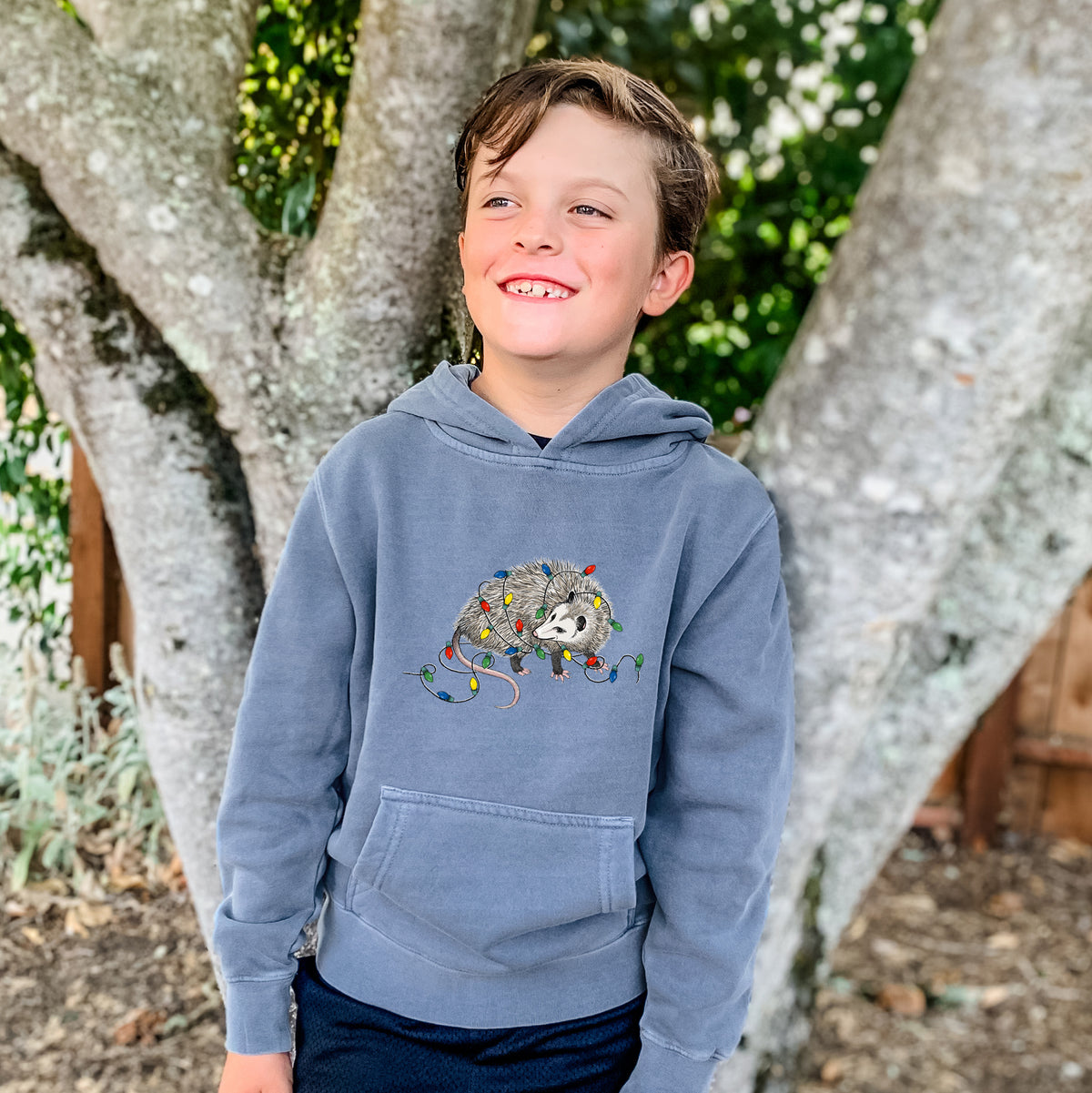 Christmas Opossum - Youth Pigment Dyed Hoodie, worn by model