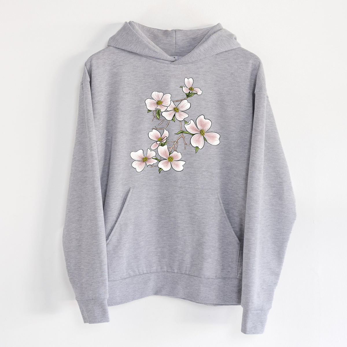 Flowering Dogwood - Cornus florida - Statement Midweight Hoodie in Heather Grey, hanging on a white wall, with a front kangaroo pocket and no drawcords.