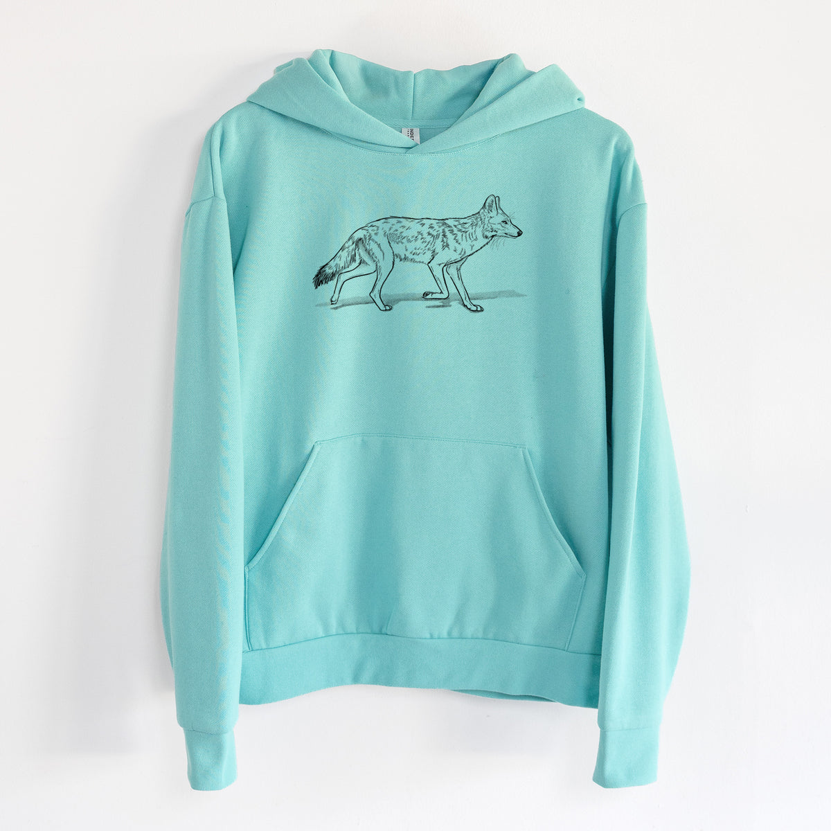 Coyote - Canis latrans - Statement Midweight Hoodie in Seafoam, hanging on a white wall, with a front kangaroo pocket and no drawcords.