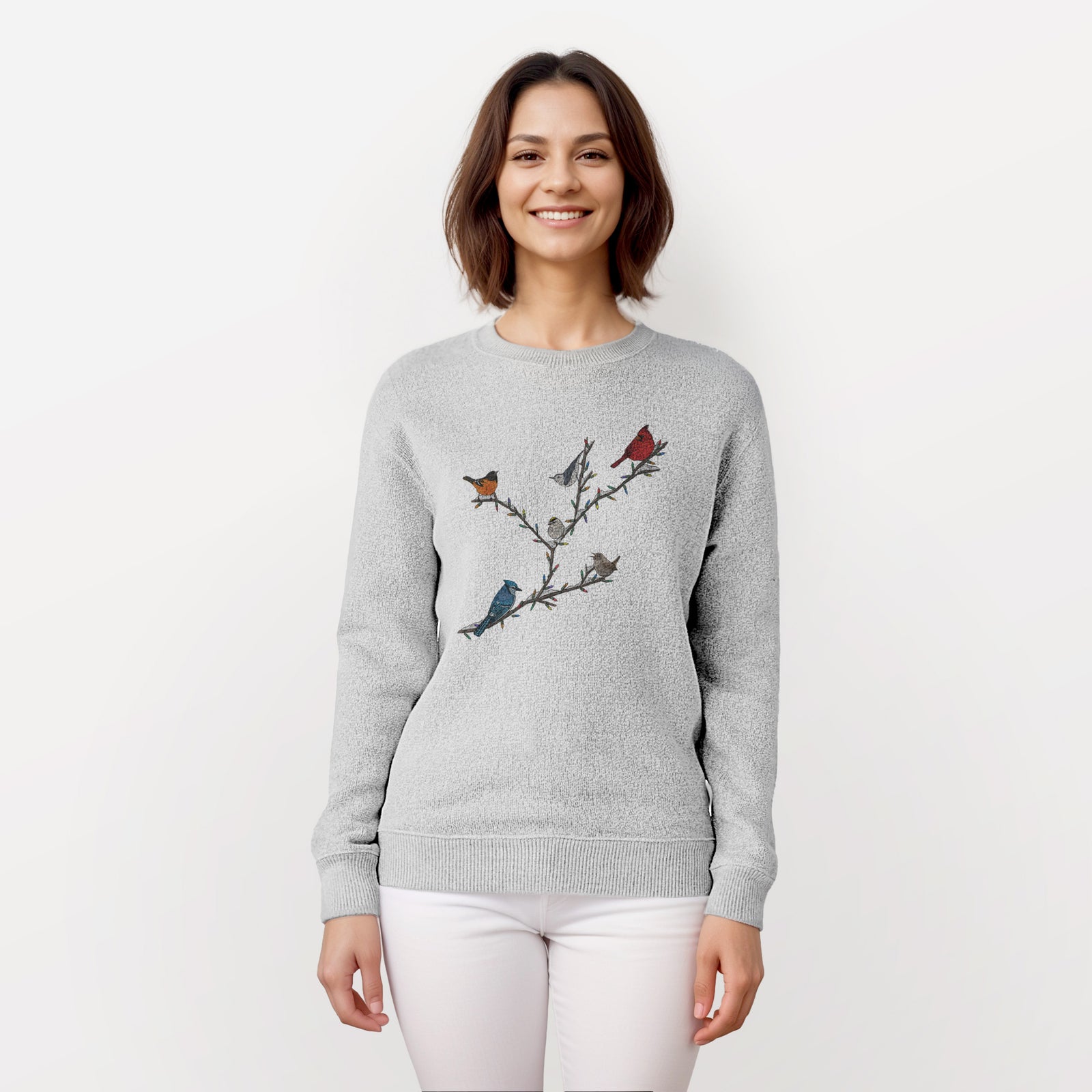 Gray sweater with bird design on a white background