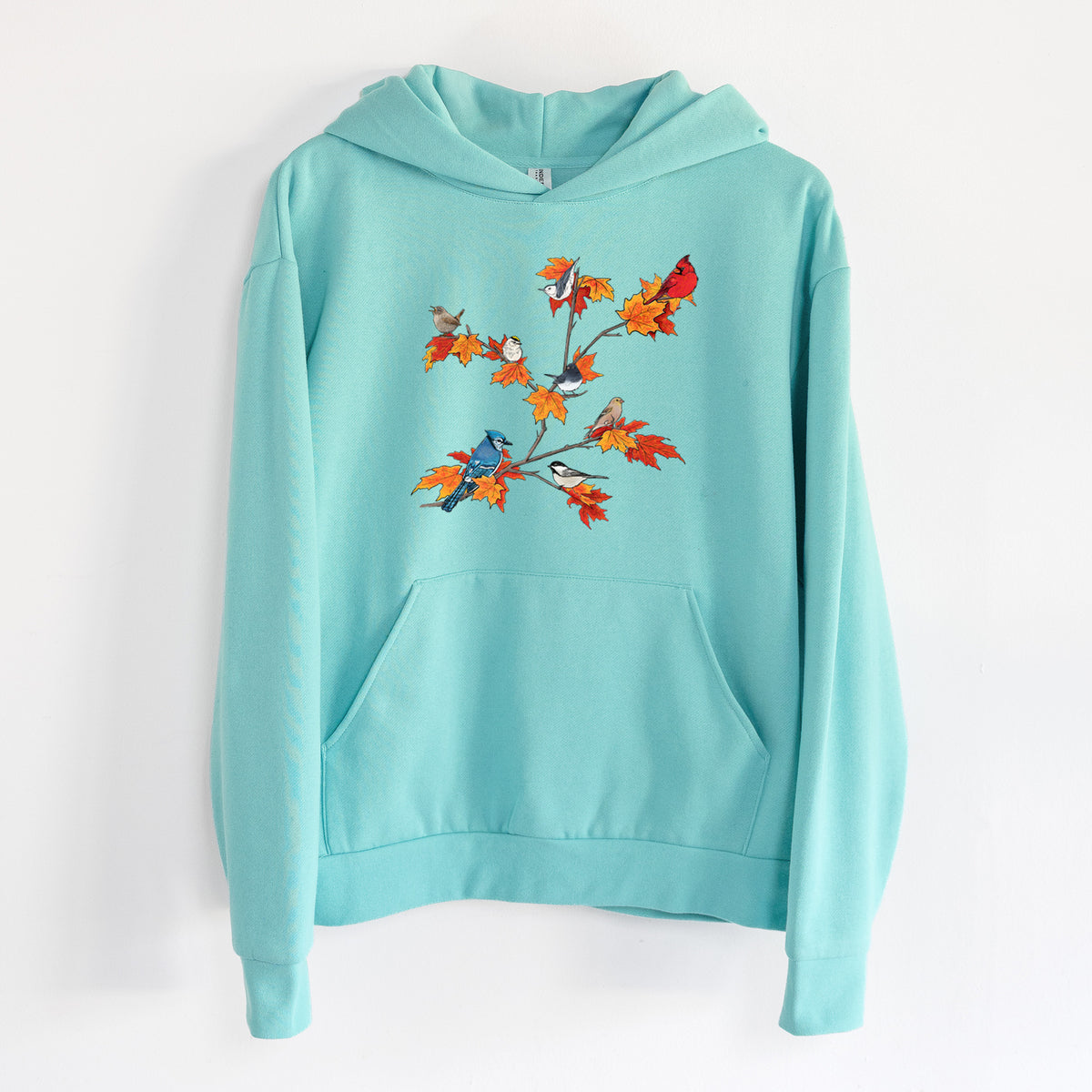 Autumn Backyard Birds - Statement Midweight Hoodie in Seafoam, hanging on a white wall, with a front kangaroo pocket and no drawcords.