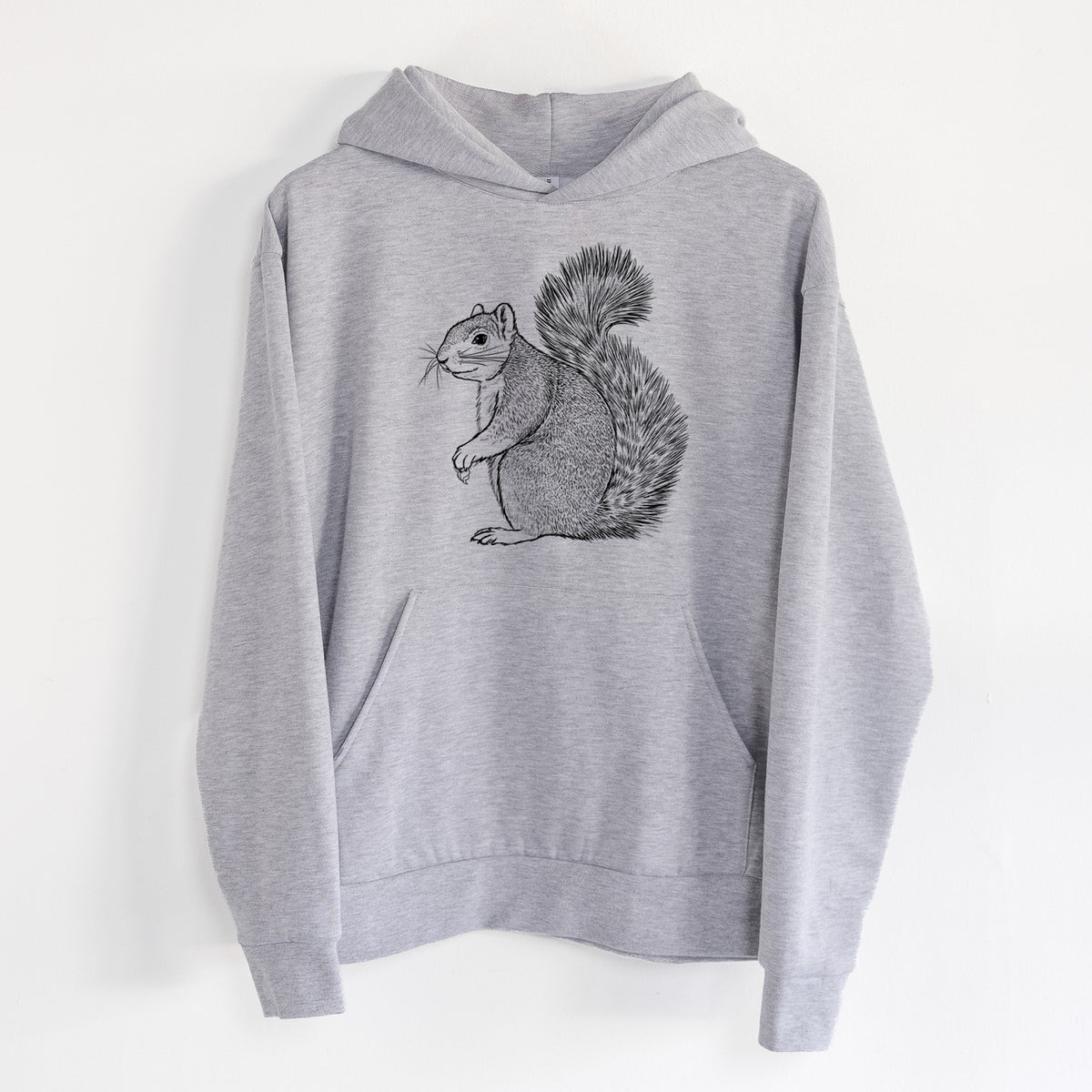 Eastern Fox Squirrel - Sciurus niger - Statement Midweight Hoodie in Heather Grey, hanging on a white wall, with a front kangaroo pocket and no drawcords.