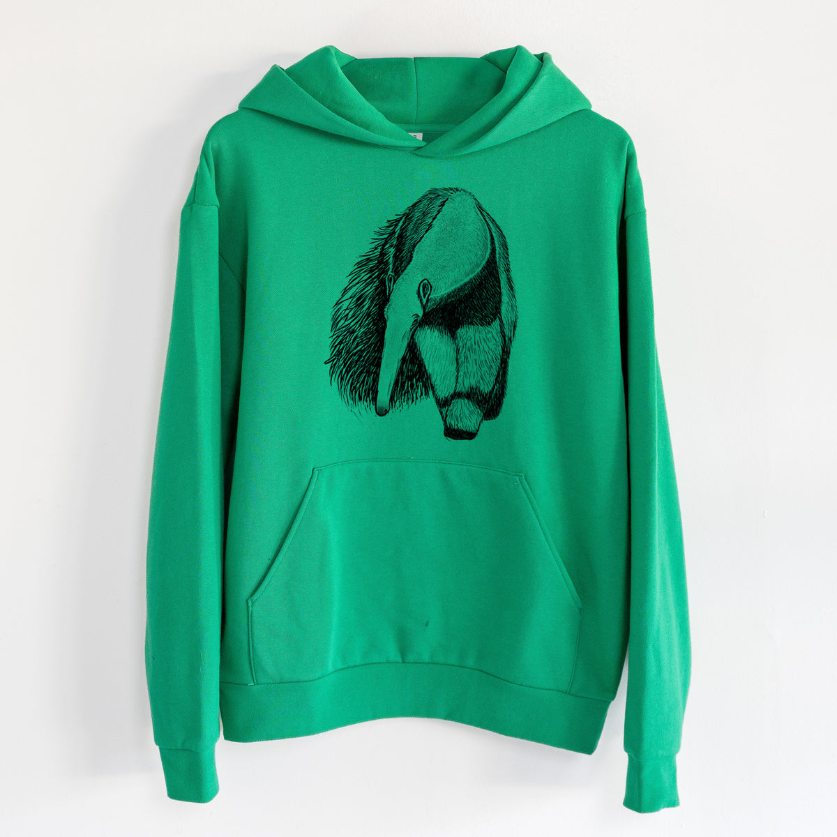 Giant Anteater - Myrmecophaga tridactyla - Statement Midweight Hoodie in Kelly Green, hanging on a white wall, with a front kangaroo pocket and no drawcords.