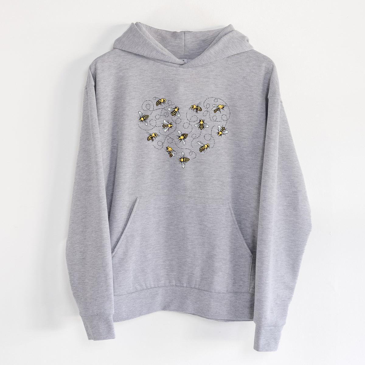 Heart Full of Honeybees - Statement Midweight Hoodie in Heather Grey, hanging on a white wall, with a front kangaroo pocket and no drawcords.