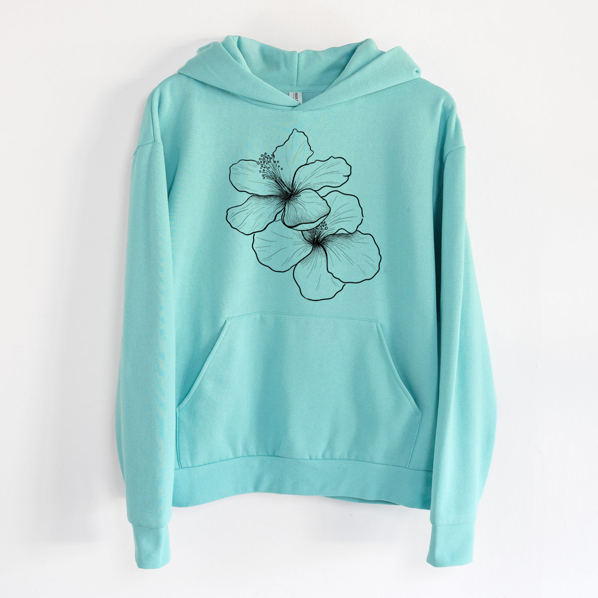Hibiscus Flowers - Statement Midweight Hoodie in Seafoam, hanging on a white wall, with a front kangaroo pocket and no drawcords.