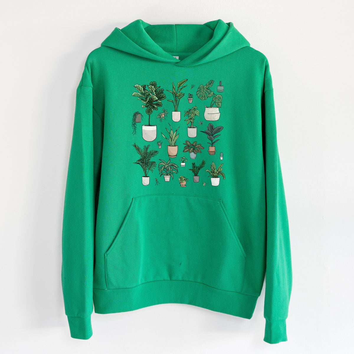 Collection of Houseplants - Statement Midweight Hoodie in Kelly Green, hanging on a white wall, with a front kangaroo pocket and no drawcords.