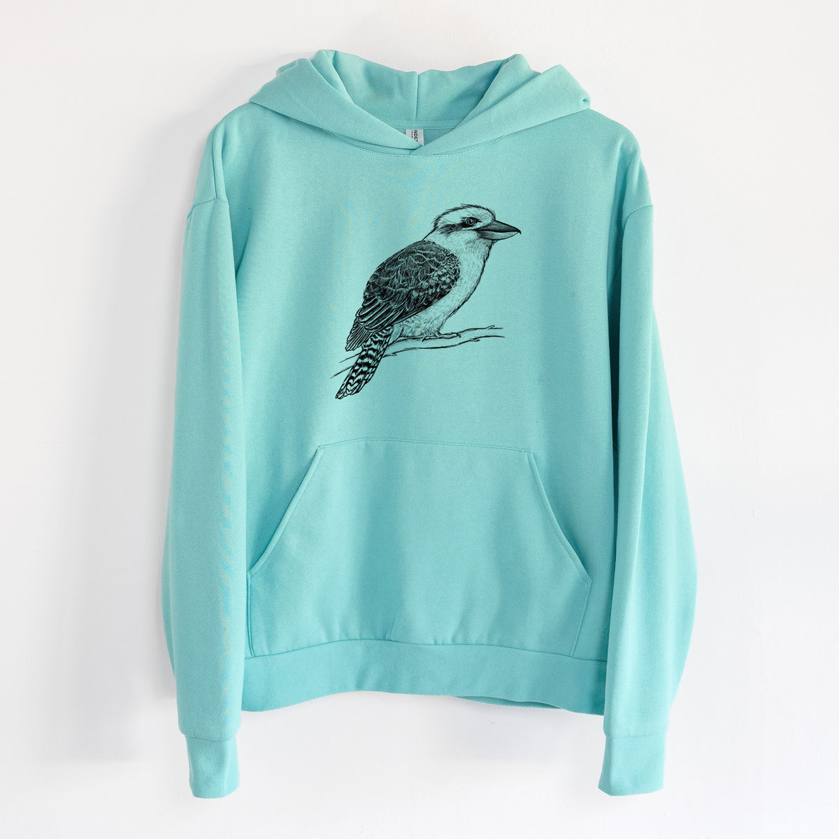 Kookaburra - Dacelo novaeguineae - Statement Midweight Hoodie in Seafoam, hanging on a white wall, with a front kangaroo pocket and no drawcords.