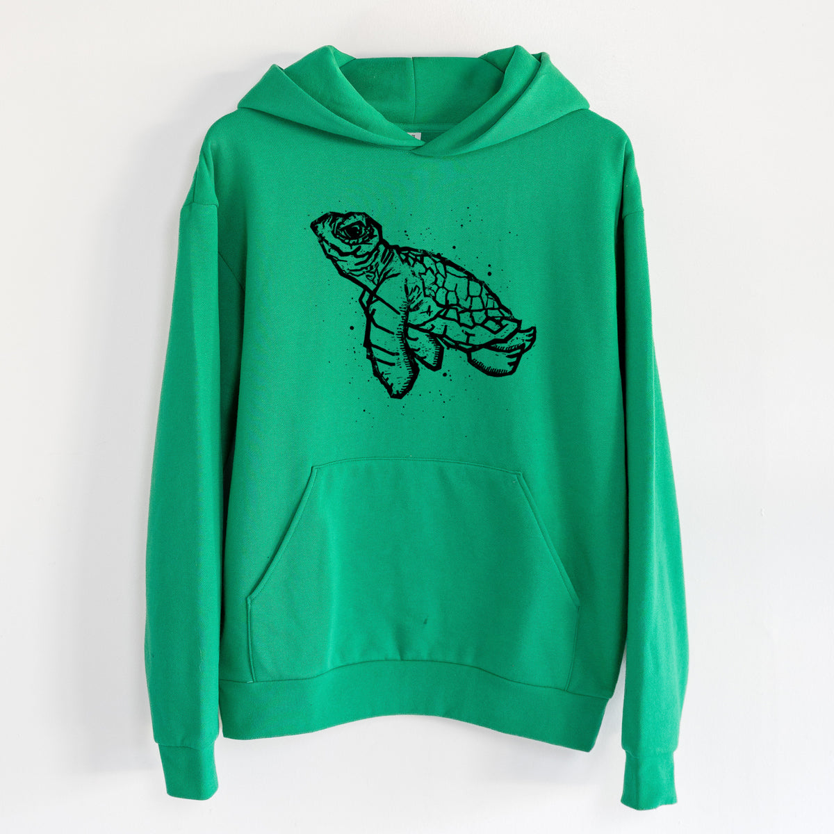 Baby Sea Turtle - Statement Midweight Hoodie in Kelly Green, hanging on a white wall, with a front kangaroo pocket and no drawcords.