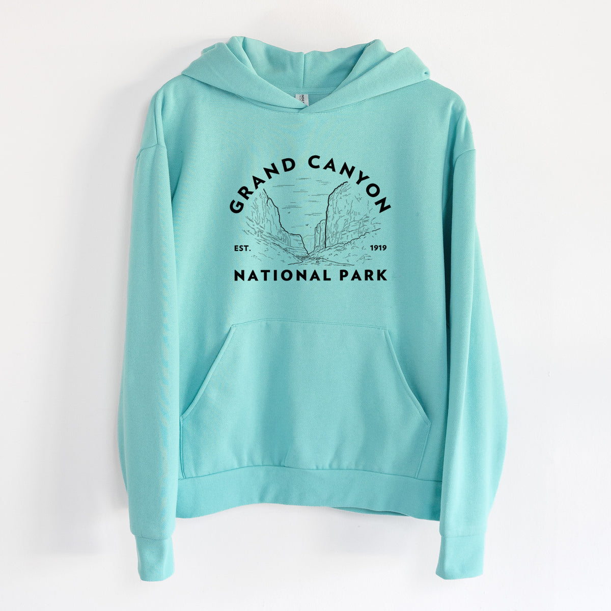 Grand Canyon National Park - Statement Midweight Hoodie in Seafoam, hanging on a white wall, with a front kangaroo pocket and no drawcords.